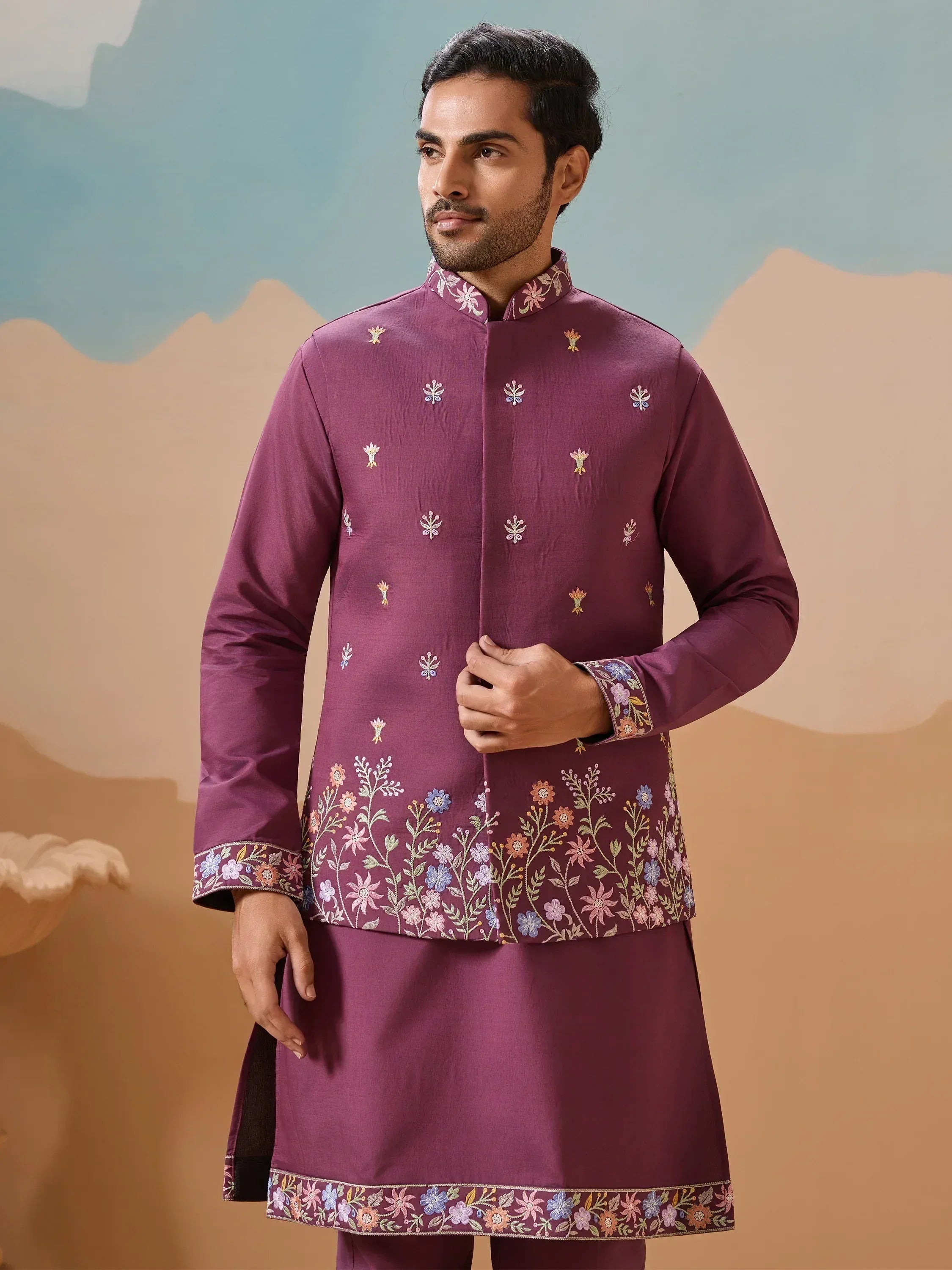 Man in maroon embroidered kurta with floral motifs, perfect for Indian ethnic wear occasions