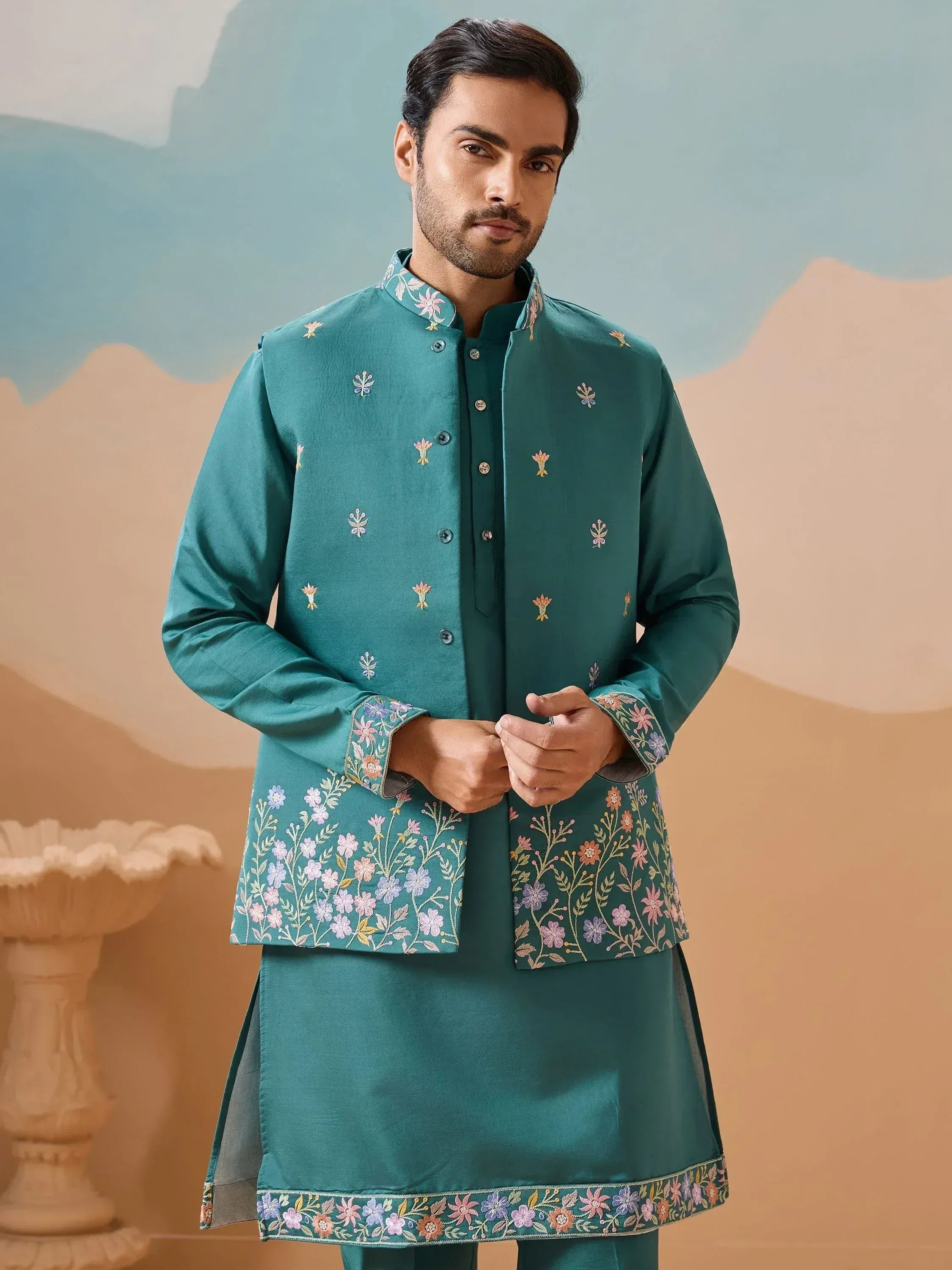 Teal embroidered kurta set with floral detailing for men's ethnic wear