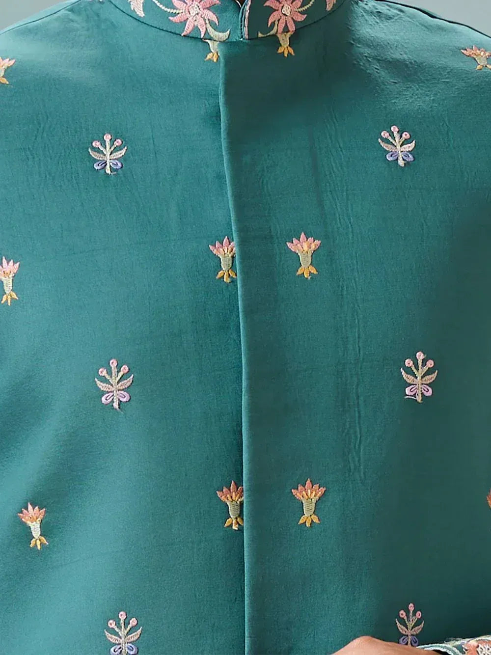Teal ethnic kurta with floral embroidery for festive occasions