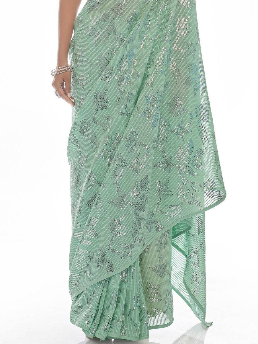 Mint green sequin saree with floral pattern, elegant ethnic wear for women