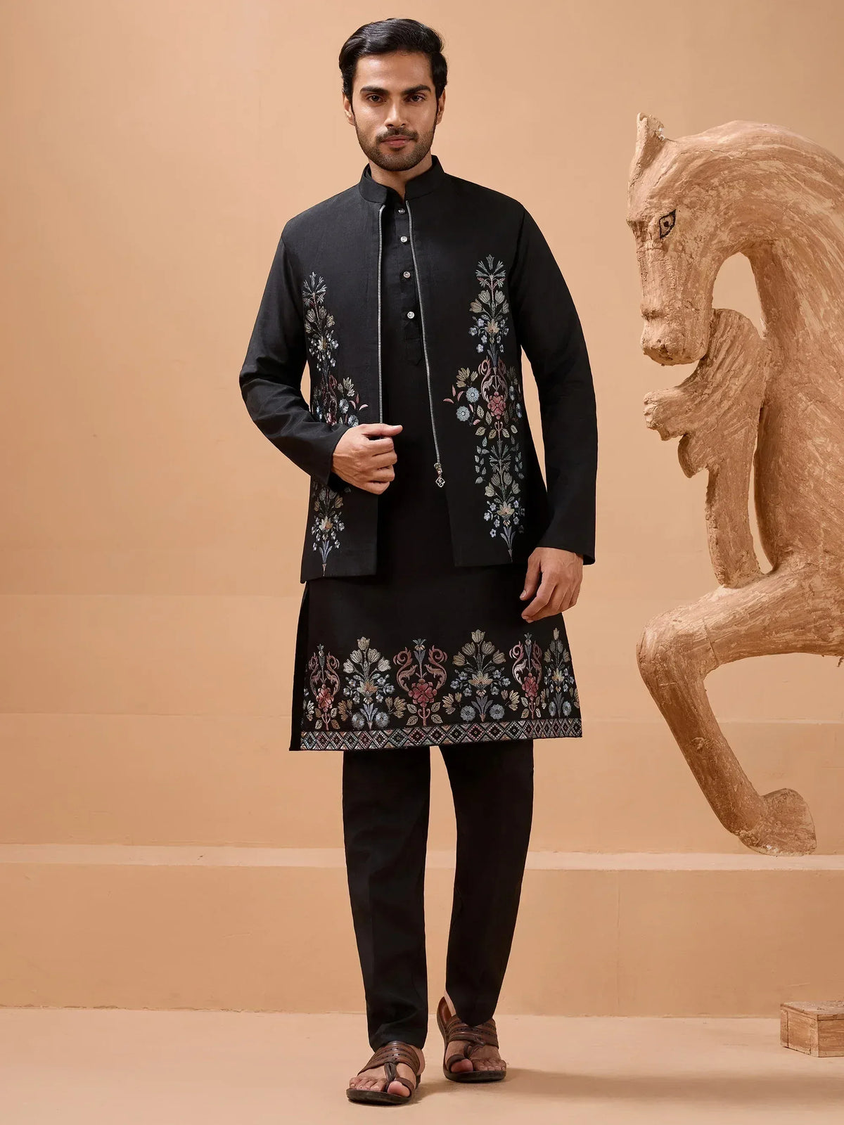 Black embroidered kurta set with floral design, perfect for Indian ethnic occasions and festive wear.