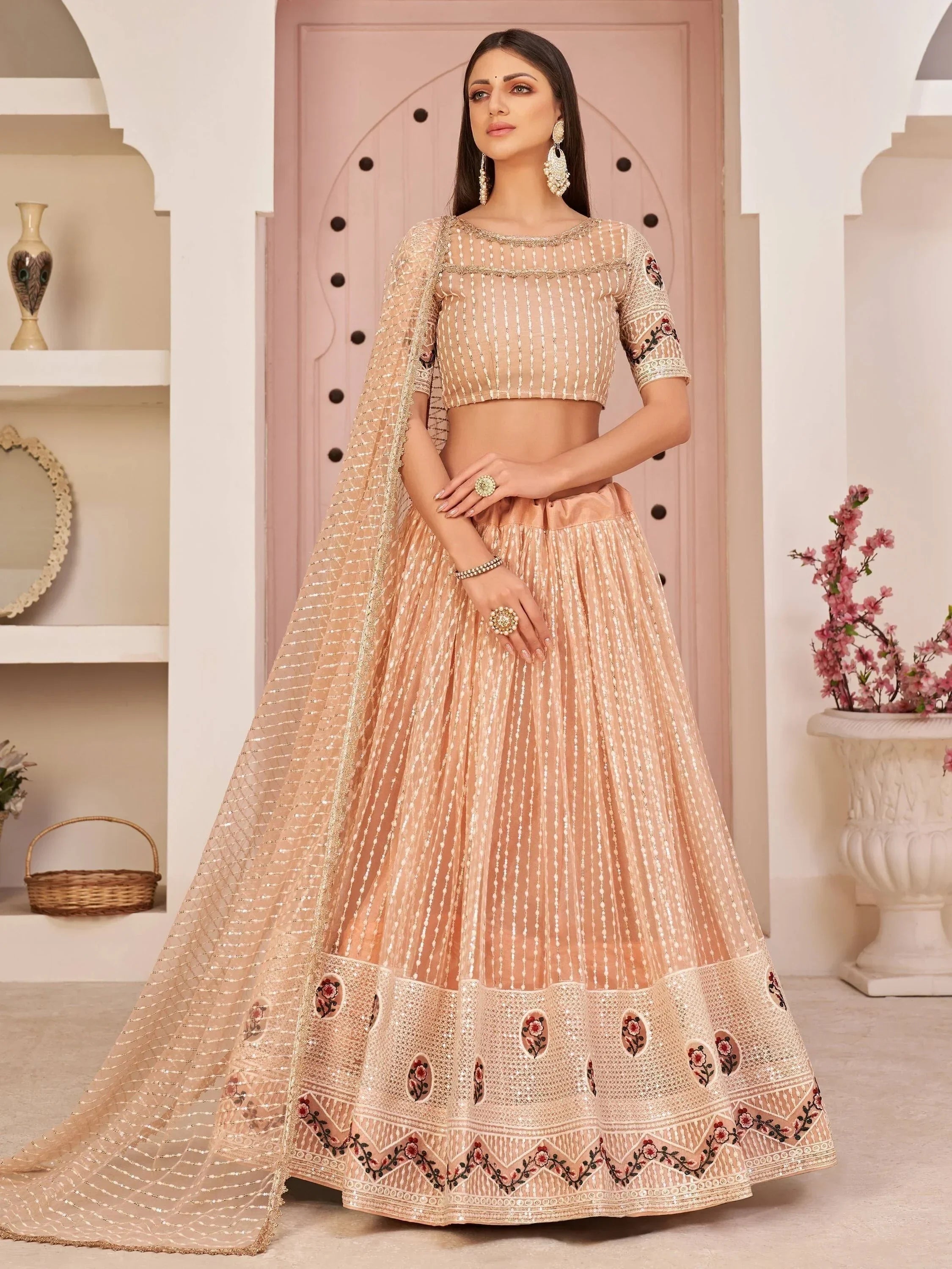 Perfect Peach Thread Embroidered Net Festive Wear Lehenga Choli