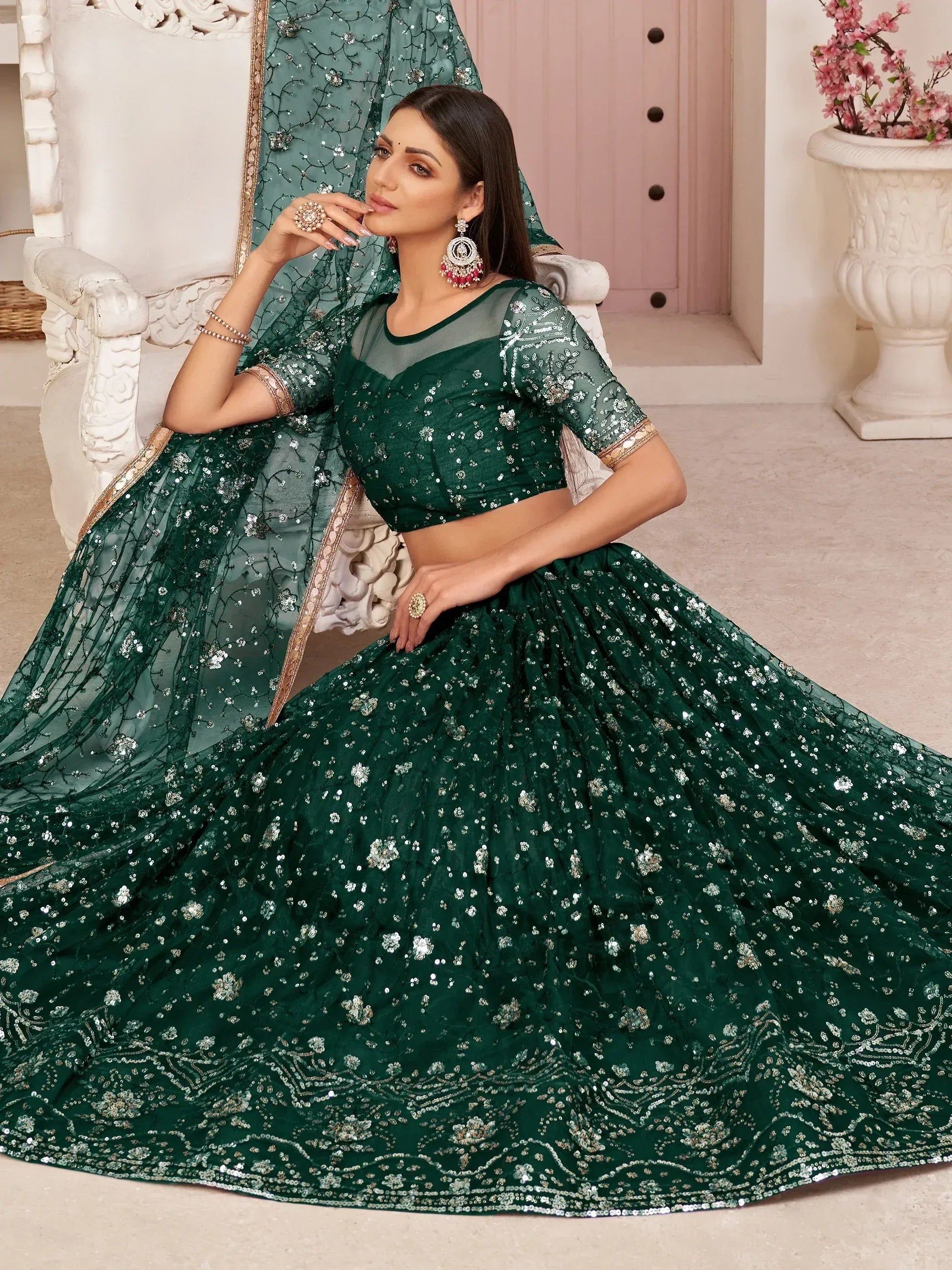 Awesome Bottle Green Sequins Embroidered Net Lehenga Choli