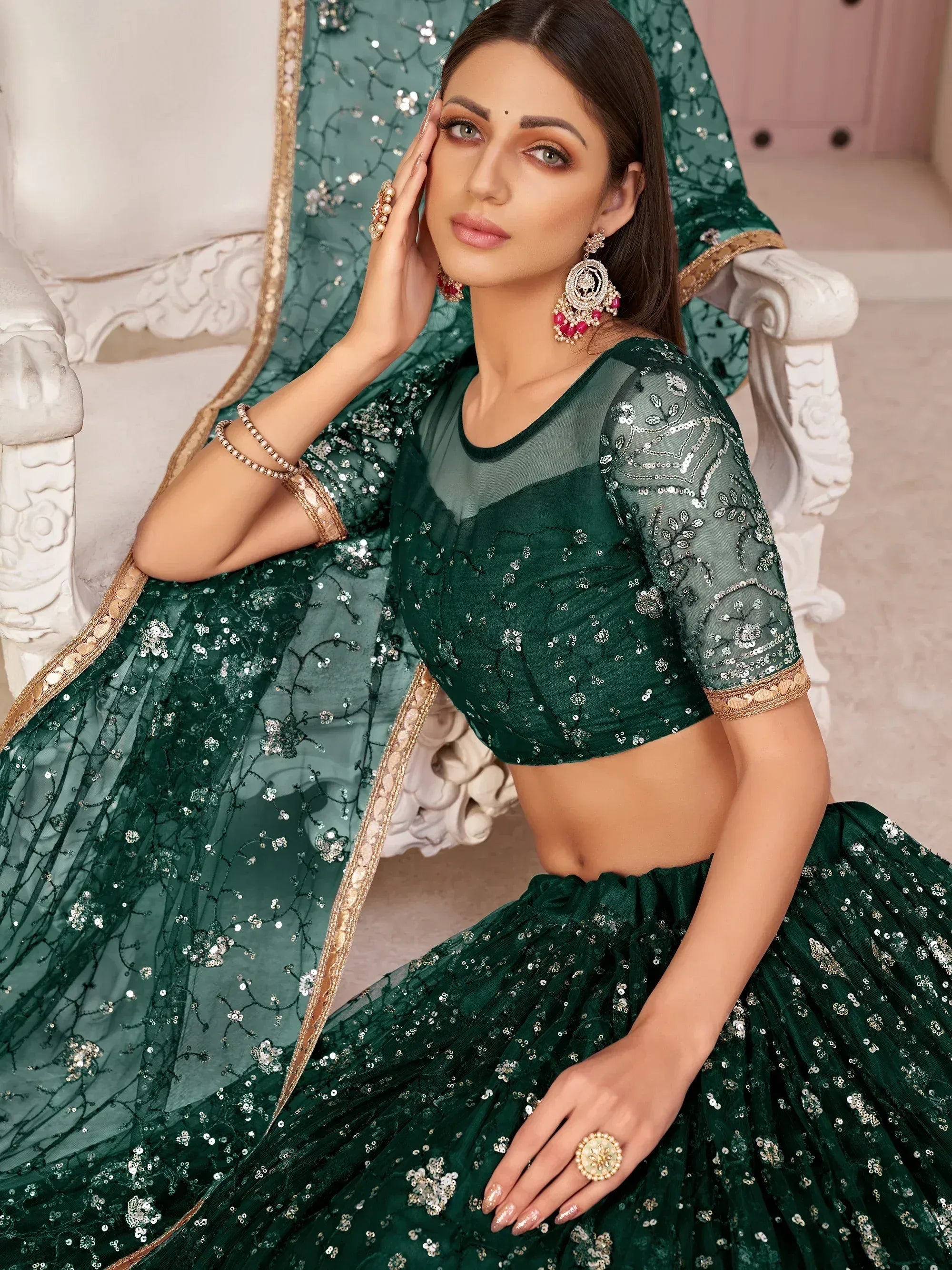 Awesome Bottle Green Sequins Embroidered Net Lehenga Choli