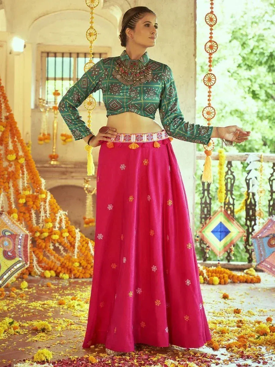 Green printed crop top with pink embroidered lehenga, festive Indian ethnic wear for women