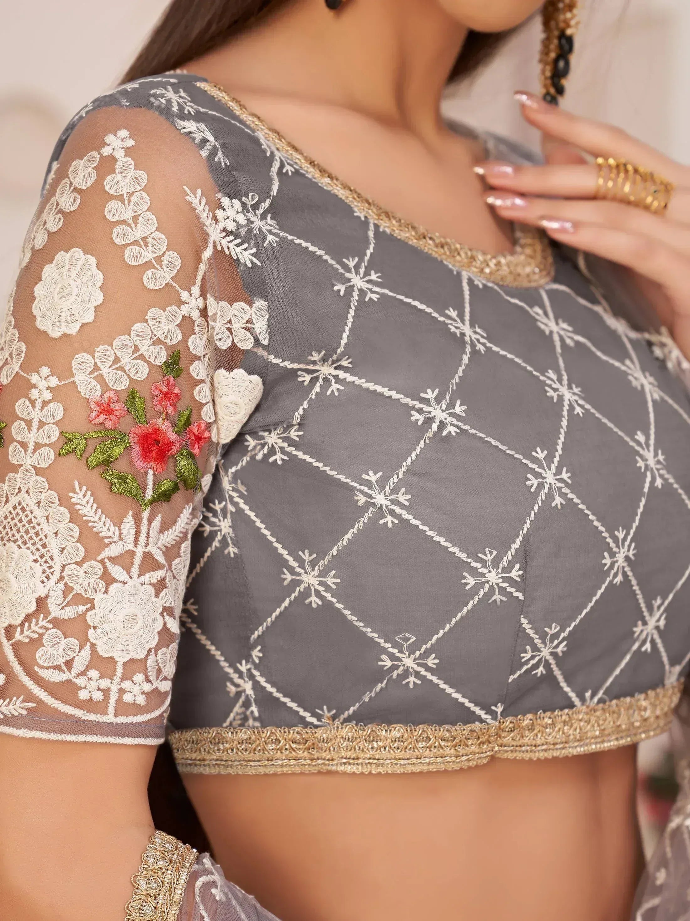 Grey embroidered blouse with floral lace sleeves and gold trim, perfect for ethnic wear