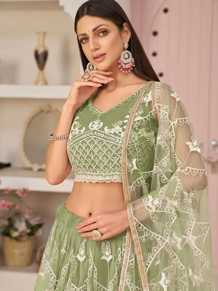 Green embroidered lehenga choli with sheer dupatta, ethnic Indian wear for women