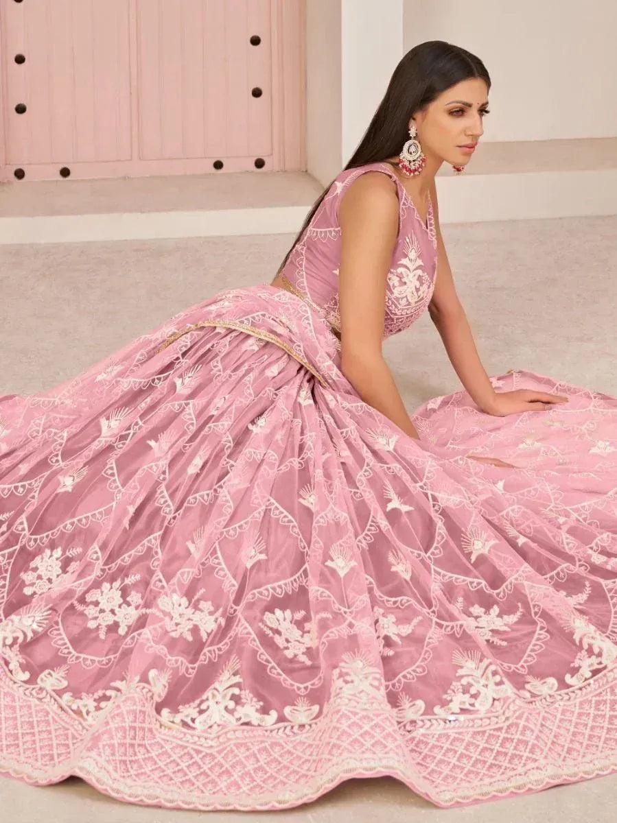 Pink designer lehenga choli with white floral embroidery, perfect for Indian ethnic wear occasions