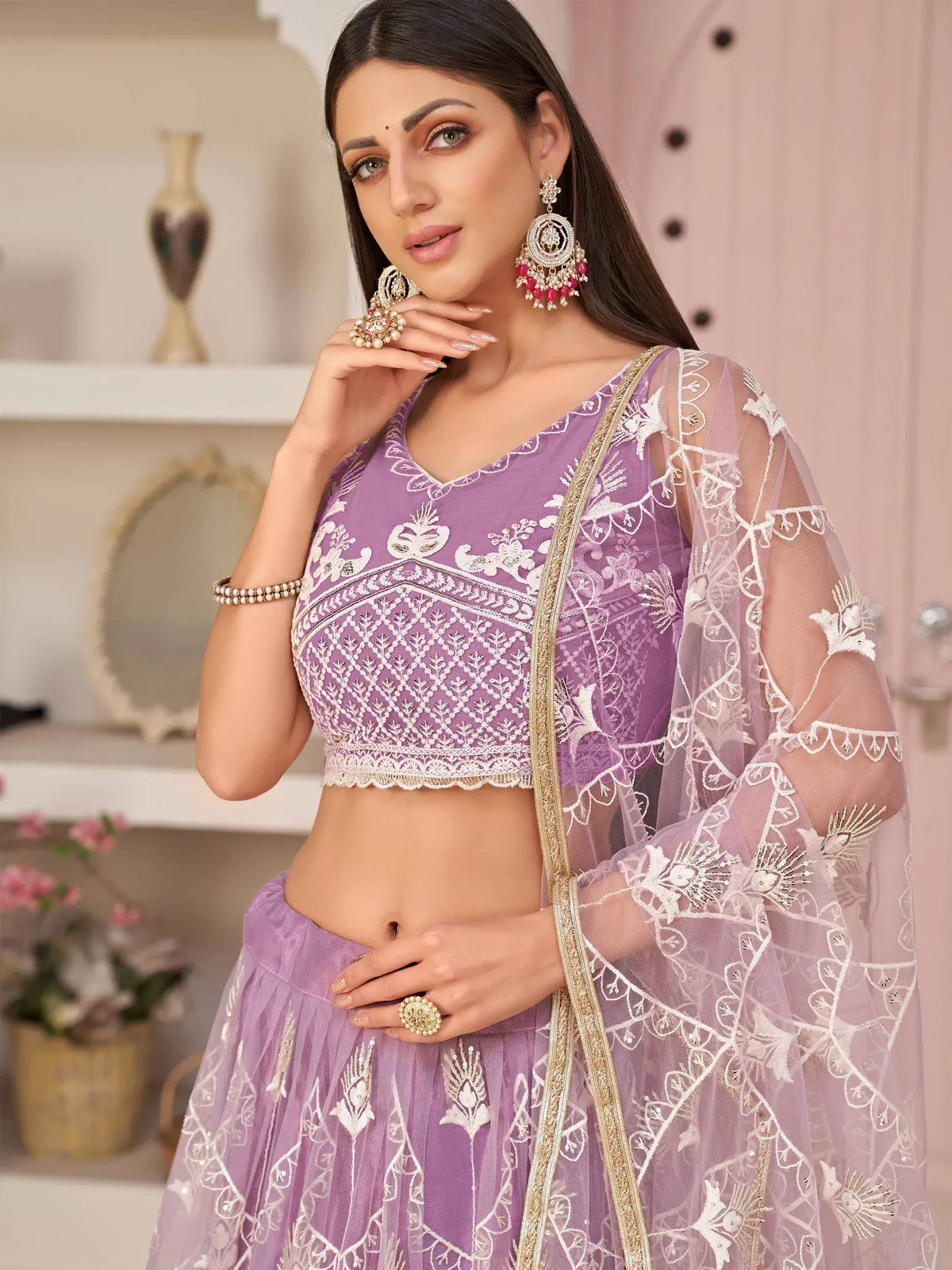 Purple embroidered lehenga choli with sheer dupatta and gold detailing