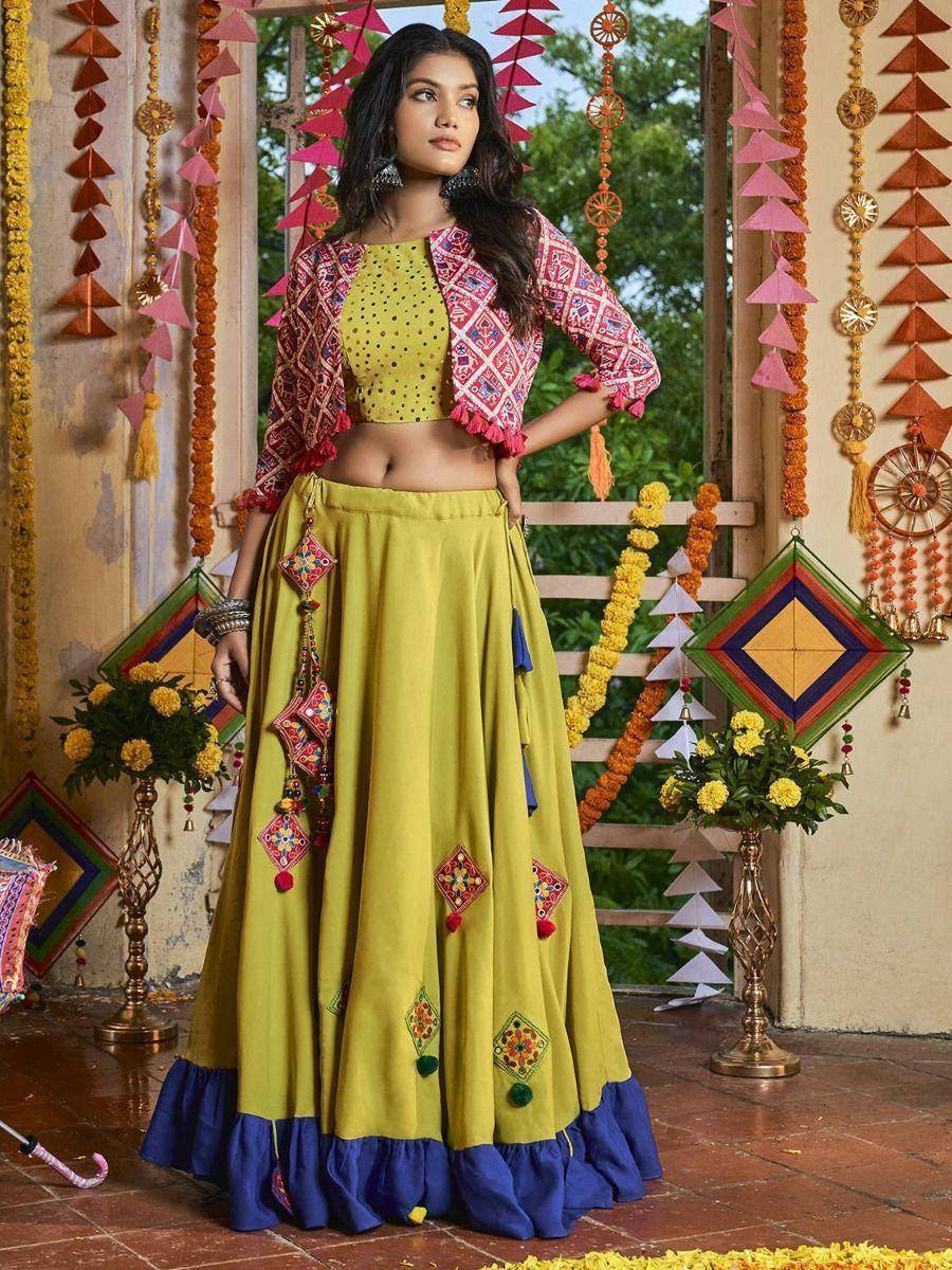 Yellow embroidered lehenga choli with pink jacket, festive Indian ethnic wear for women