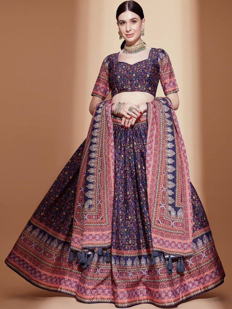 Designer lehenga choli with intricate floral and border prints, perfect for ethnic occasions