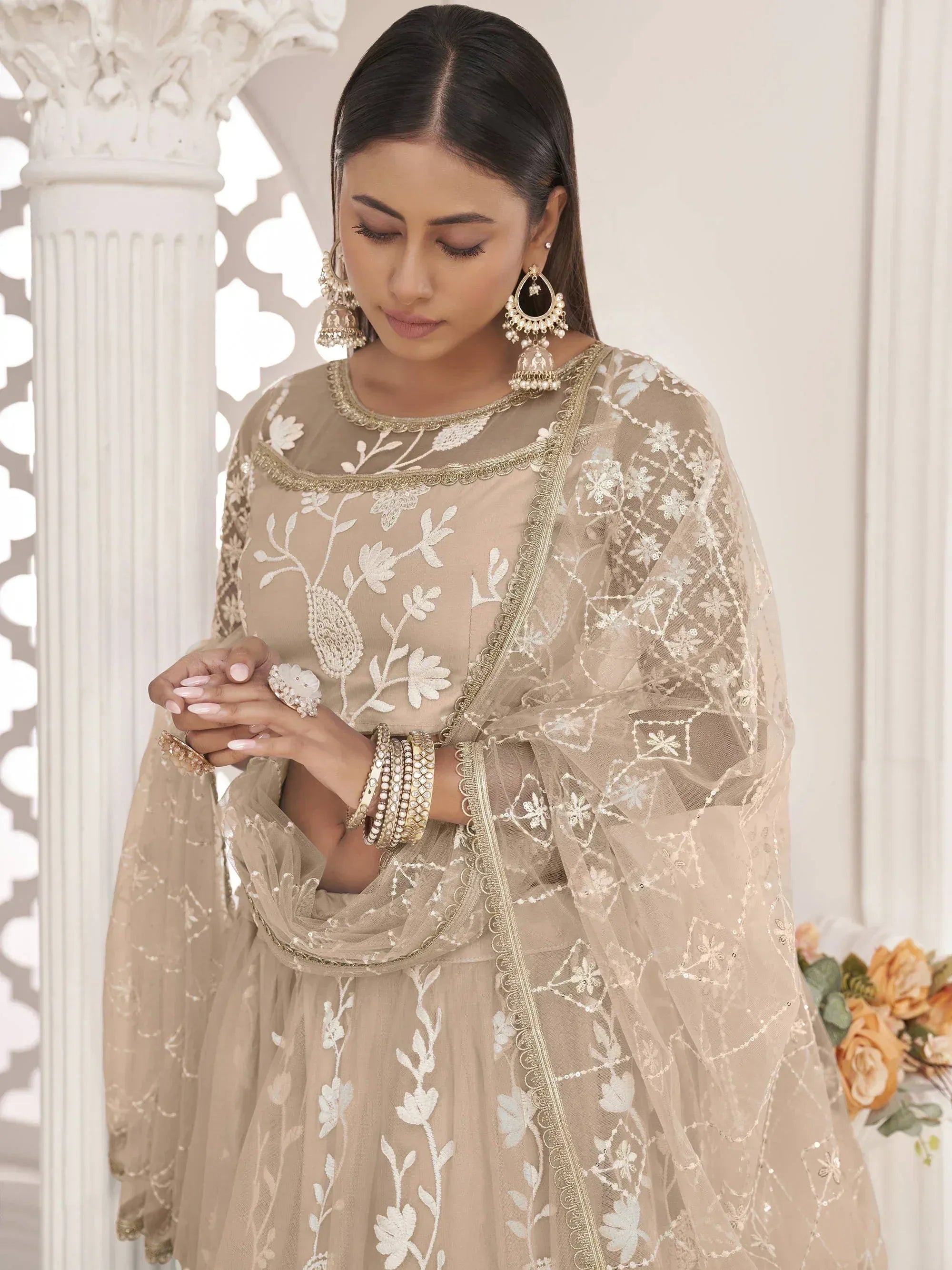 Awesome Beige Thread Embroidered Butterfly Net Lehenga Choli