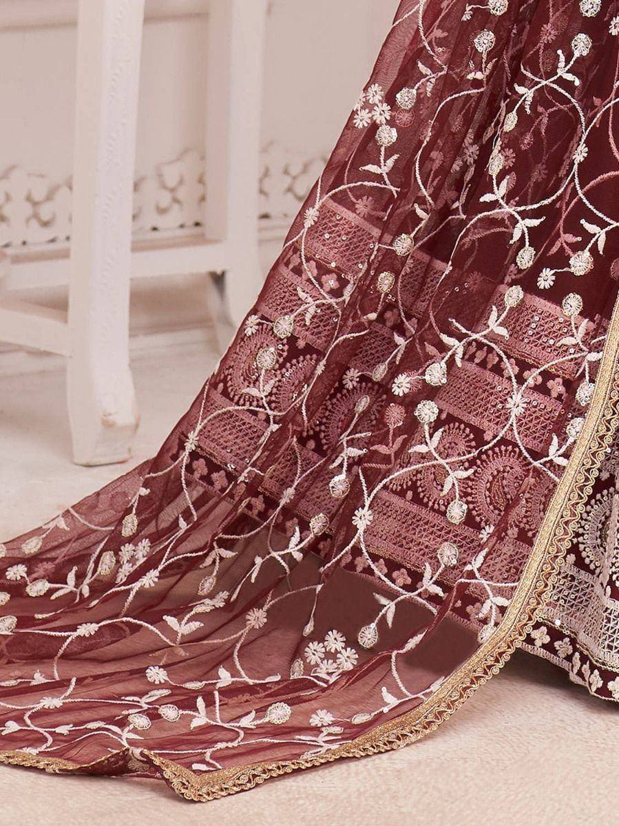 Maroon embroidered lehenga with floral zari work and gold border, ideal for Indian ethnic wear occasions