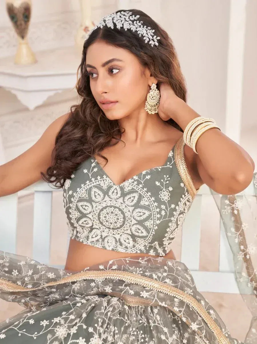Elegant grey lehenga choli with white embroidery, perfect for Indian ethnic wear occasions.