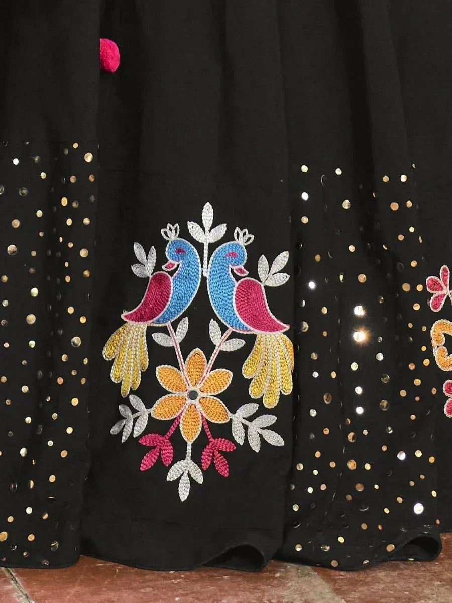 Black ethnic skirt with peacock embroidery, floral design, and mirror work details