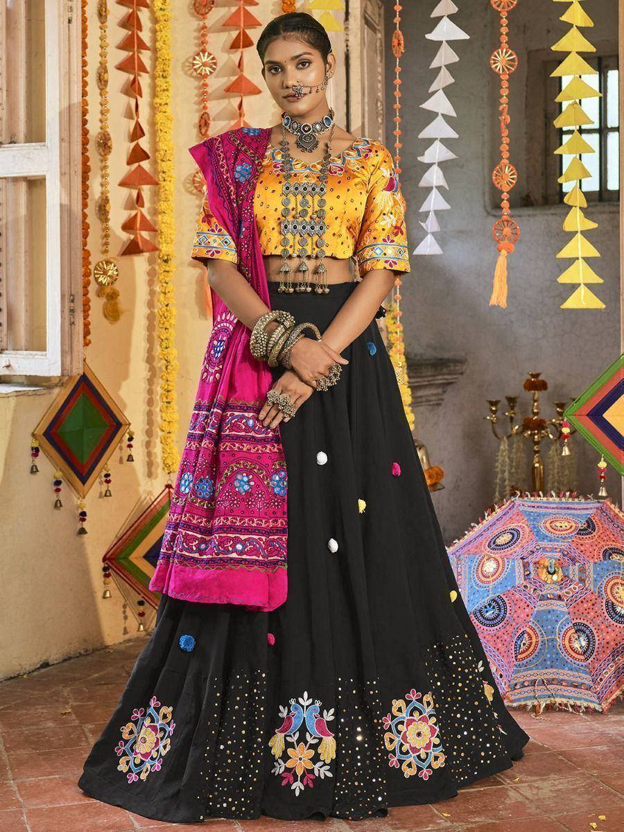 Black embroidered lehenga with yellow crop top and pink dupatta, Indian ethnic wear