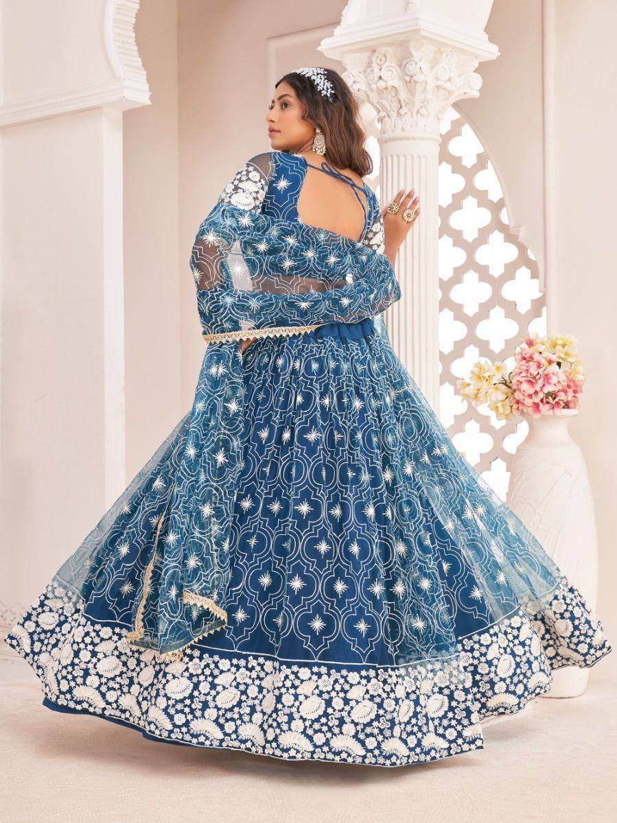 Blue and white embroidered lehenga choli with sheer dupatta, perfect for Indian ethnic wear occasions