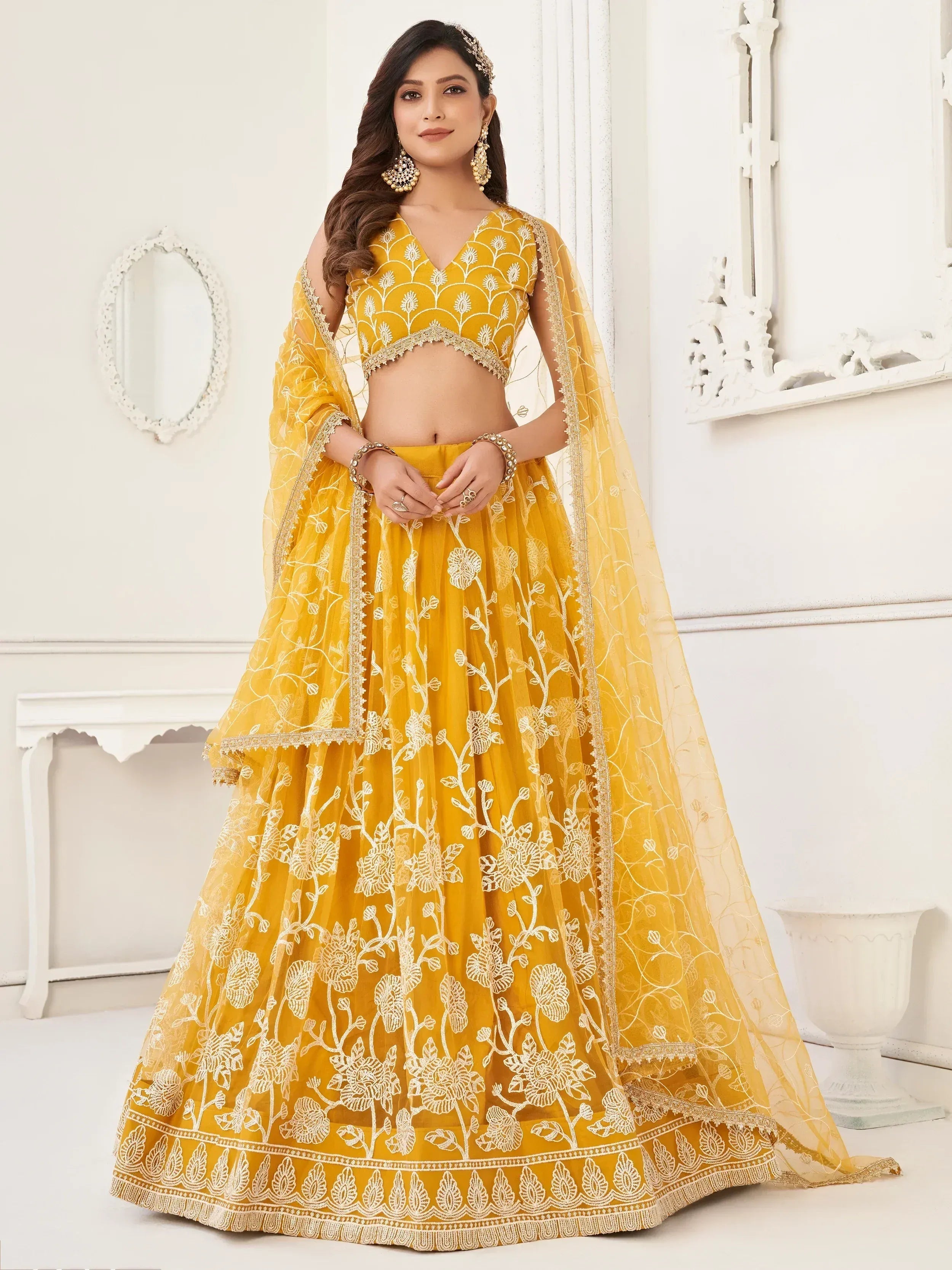Yellow floral embroidered lehenga choli with sheer dupatta, Indian ethnic wear for weddings and parties