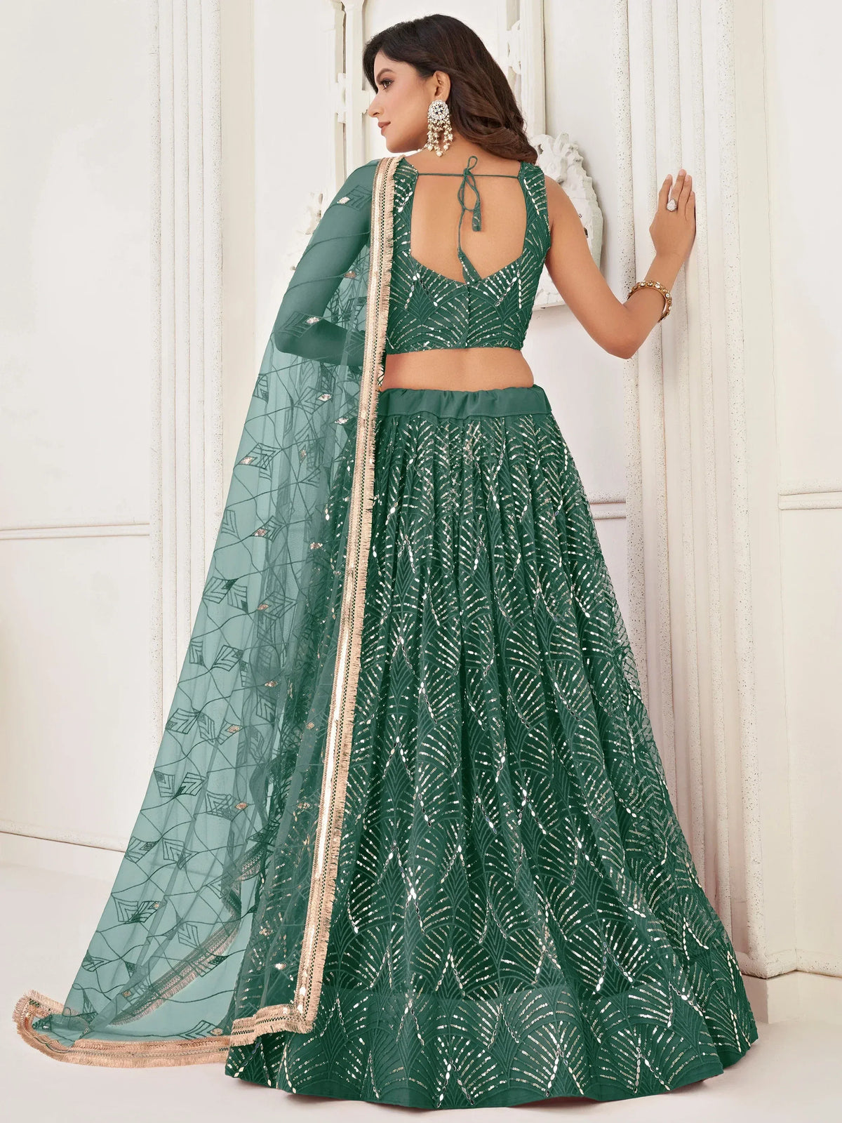 Emerald green sequin lehenga choli with sheer dupatta, ethnic Indian wear for weddings and parties