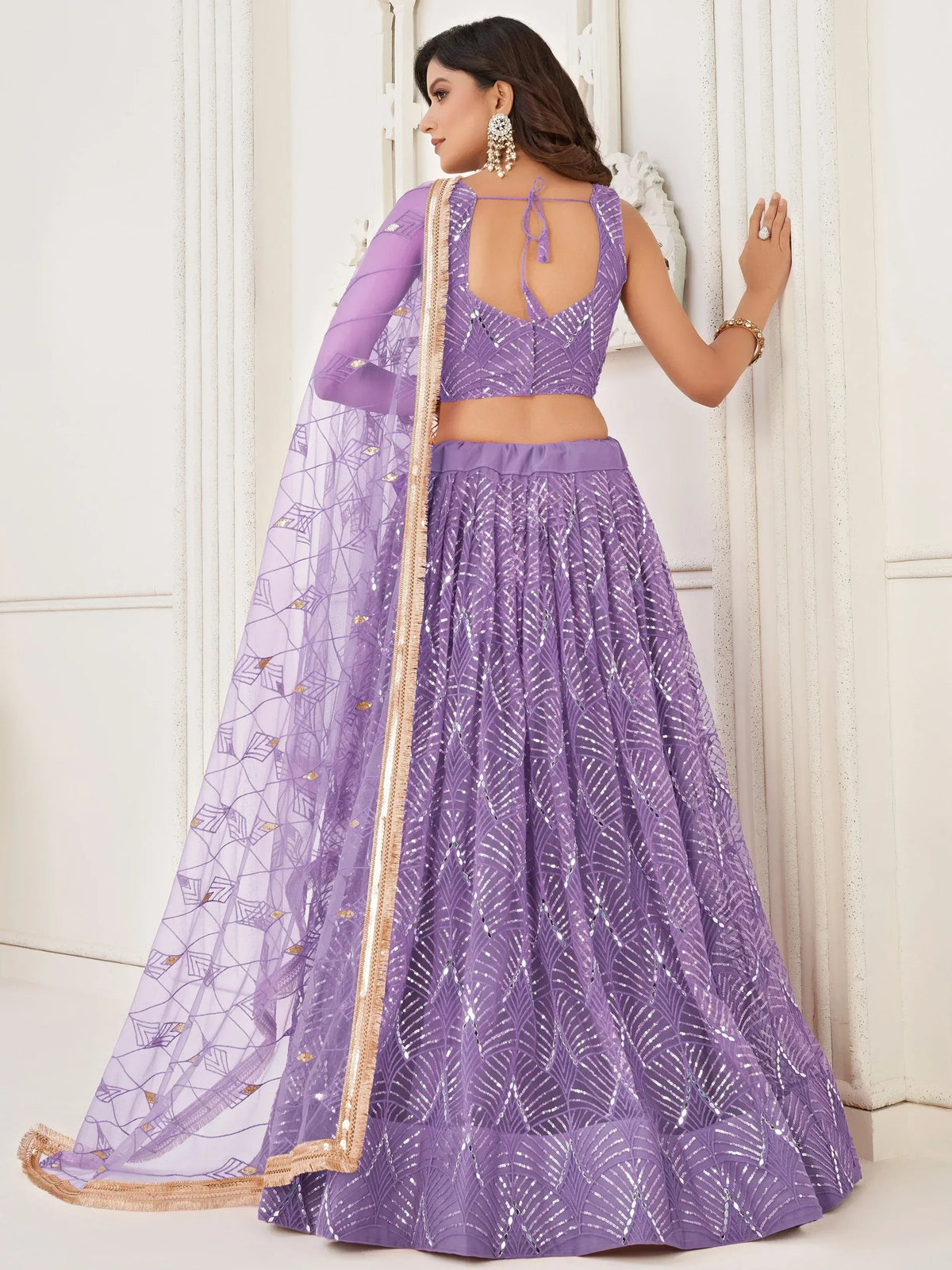 Purple sequin lehenga choli with sheer dupatta, perfect for Indian ethnic wear events