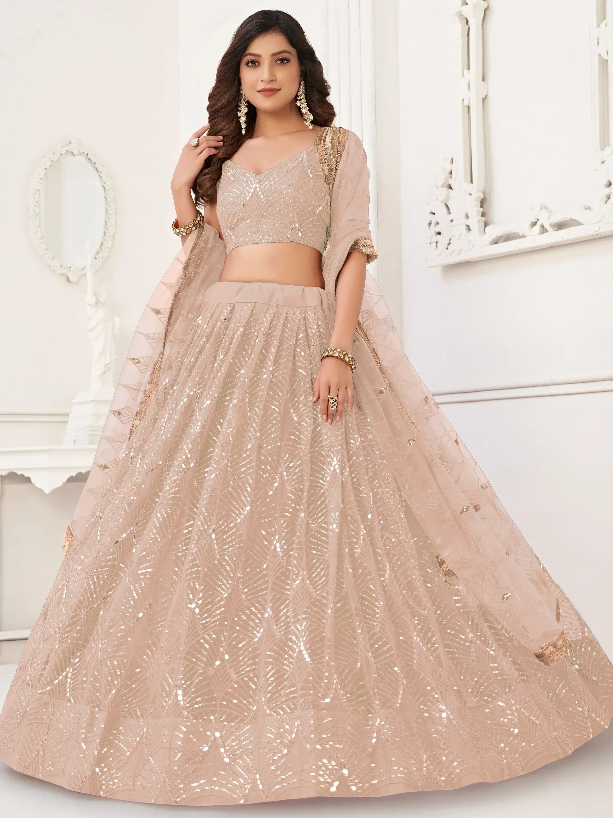 Captivating Beige Embroidered Net Engagement Wear Lehenga Choli