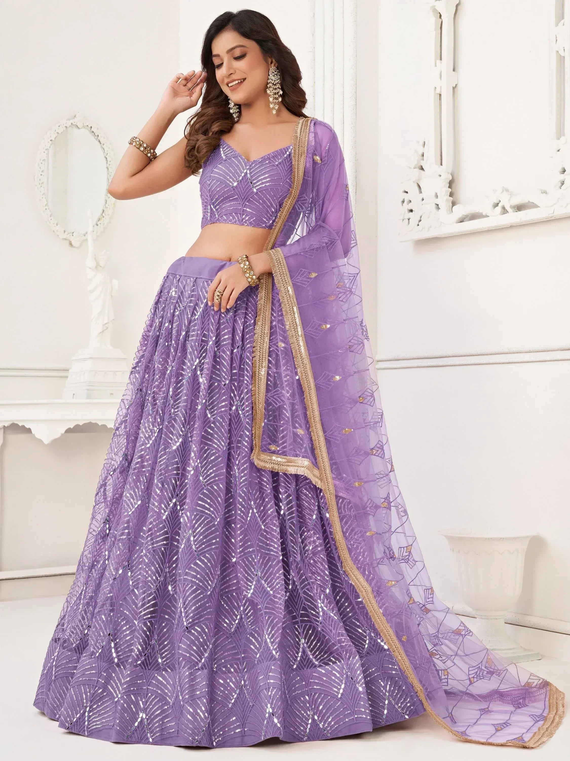 Purple designer lehenga choli with sequin work and gold border, perfect for Indian ethnic occasions