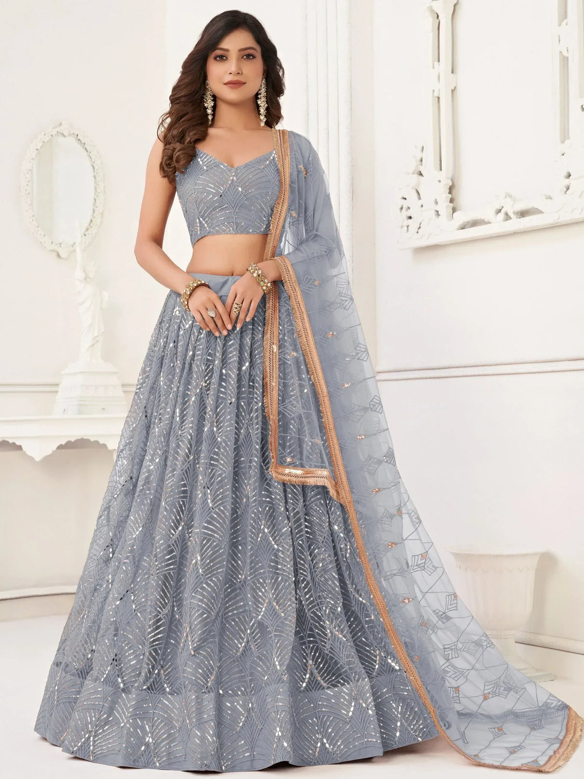 Elegant grey lehenga choli with sequin embroidery and gold trim, perfect for Indian ethnic wear