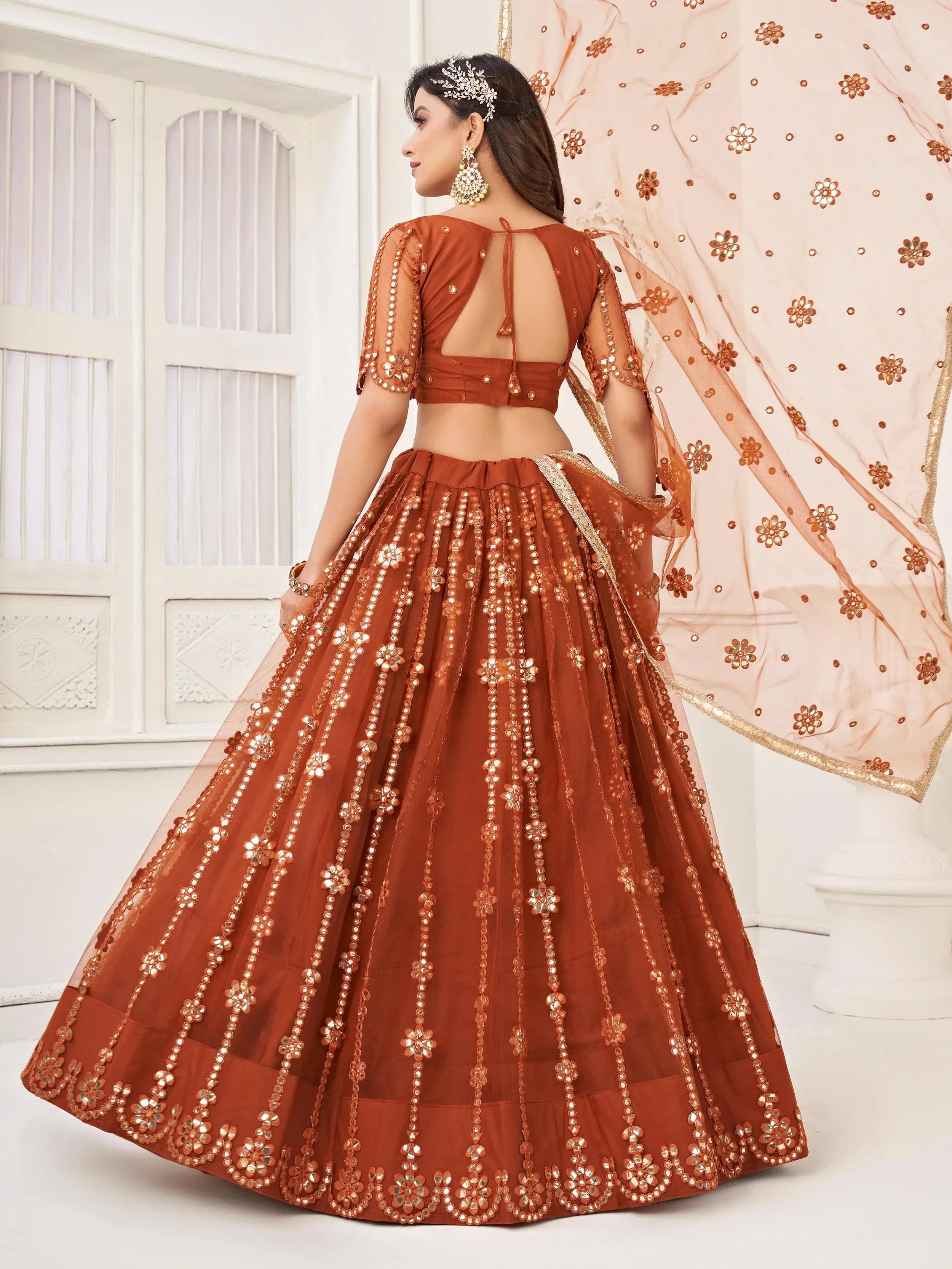 Amazing Brown Mirror Work Net Party Wear Lehenga Choli With Dupatta