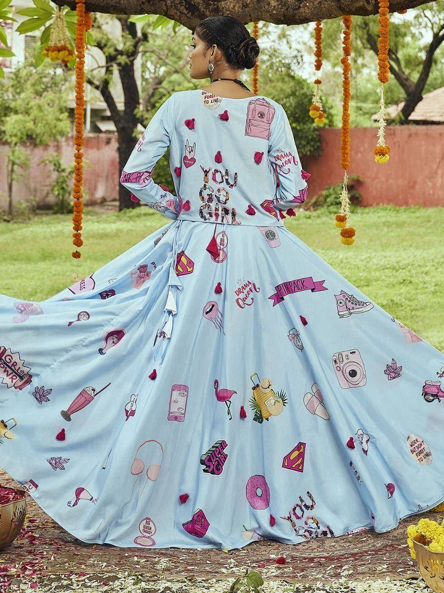 Light blue printed ethnic gown with playful graphics, perfect for festive occasions and casual wear.