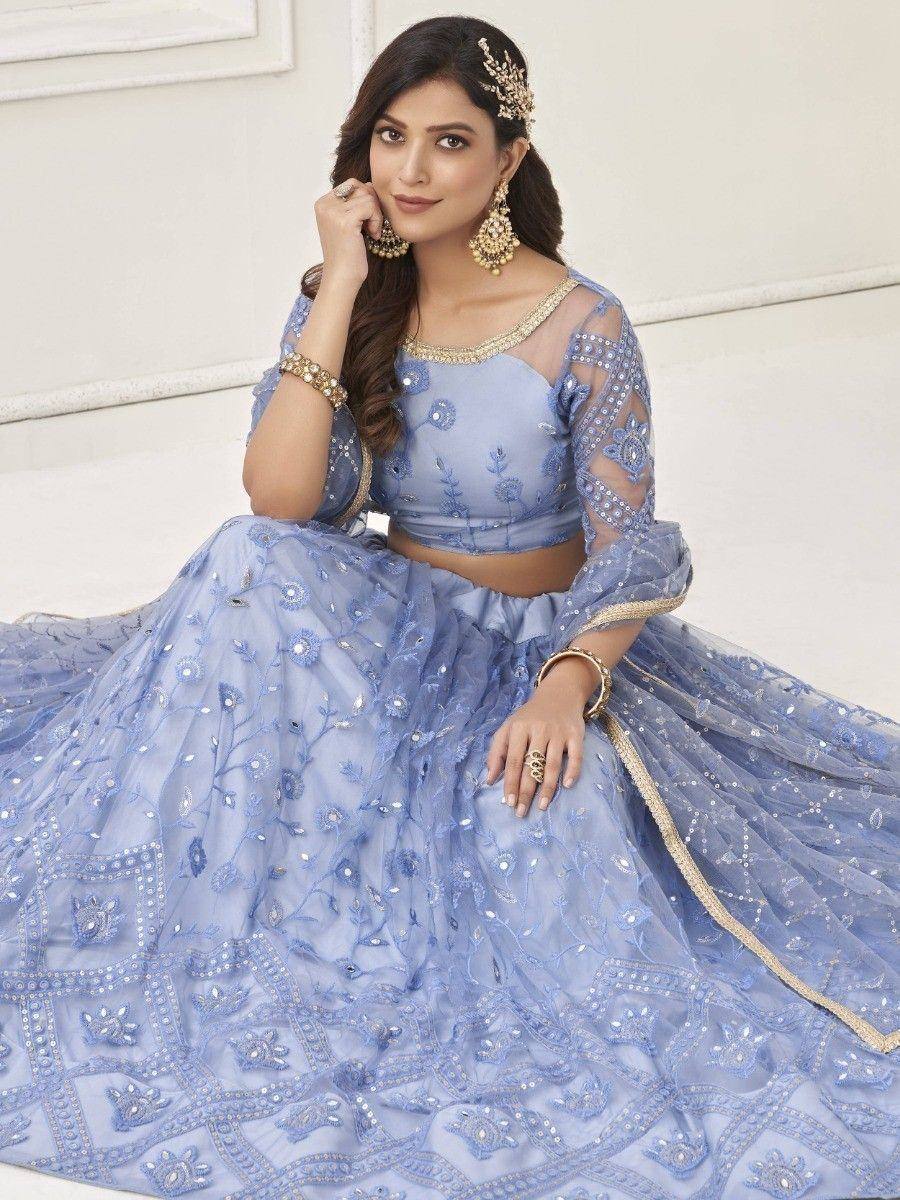 Light blue embroidered lehenga choli with sheer sleeves and gold detailing, perfect for Indian ethnic occasions
