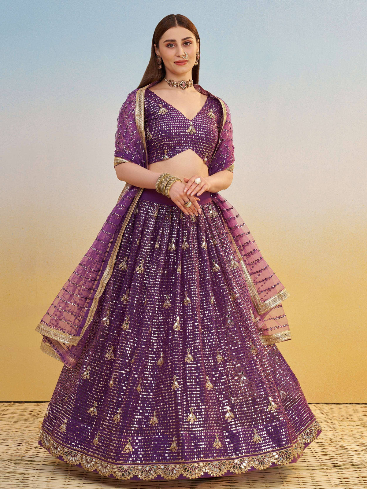 Purple sequin lehenga choli with gold embroidery, perfect for Indian weddings and festive occasions.