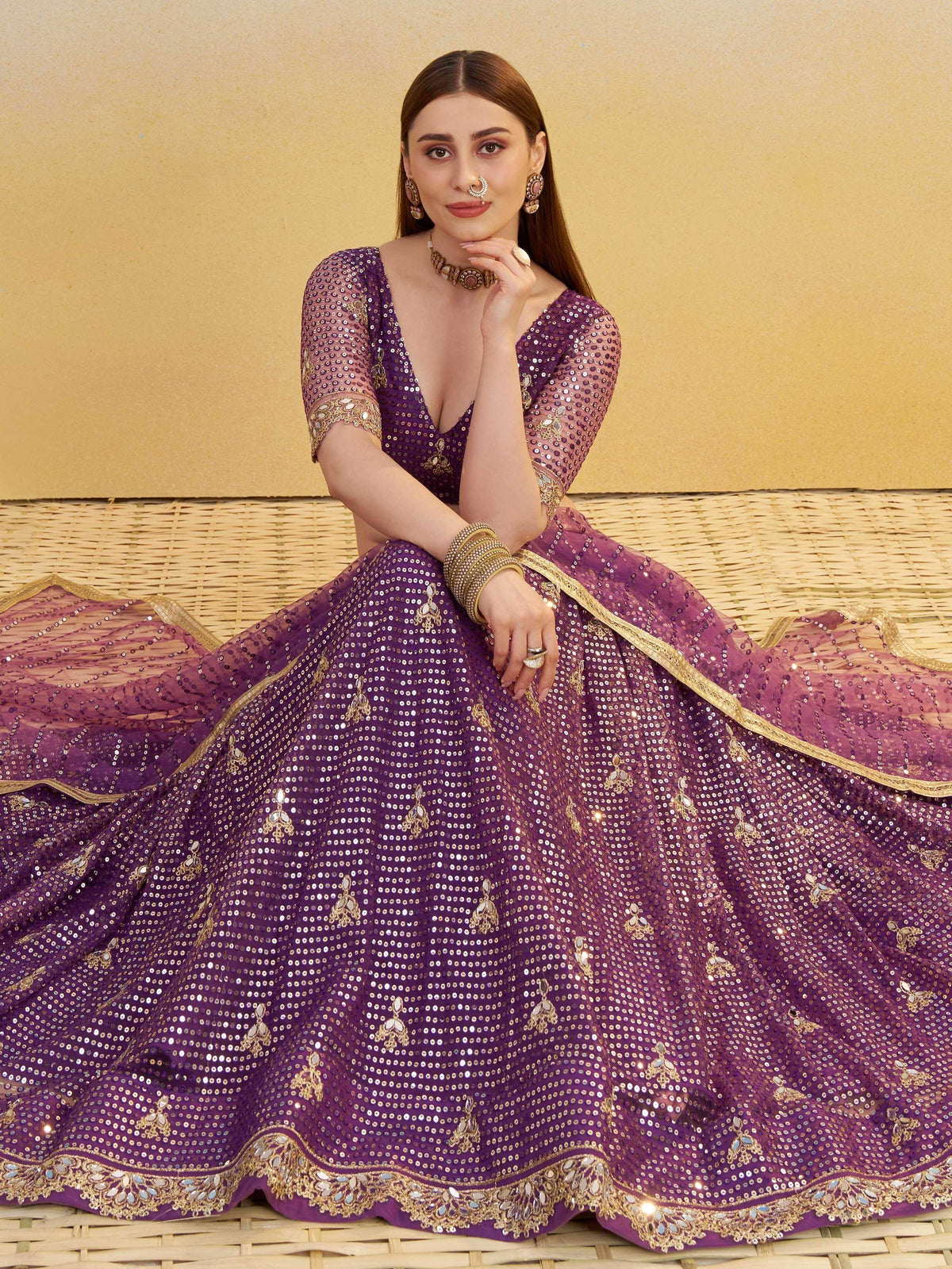 Purple sequin lehenga choli with gold embroidery, perfect for Indian ethnic wear and festive occasions.