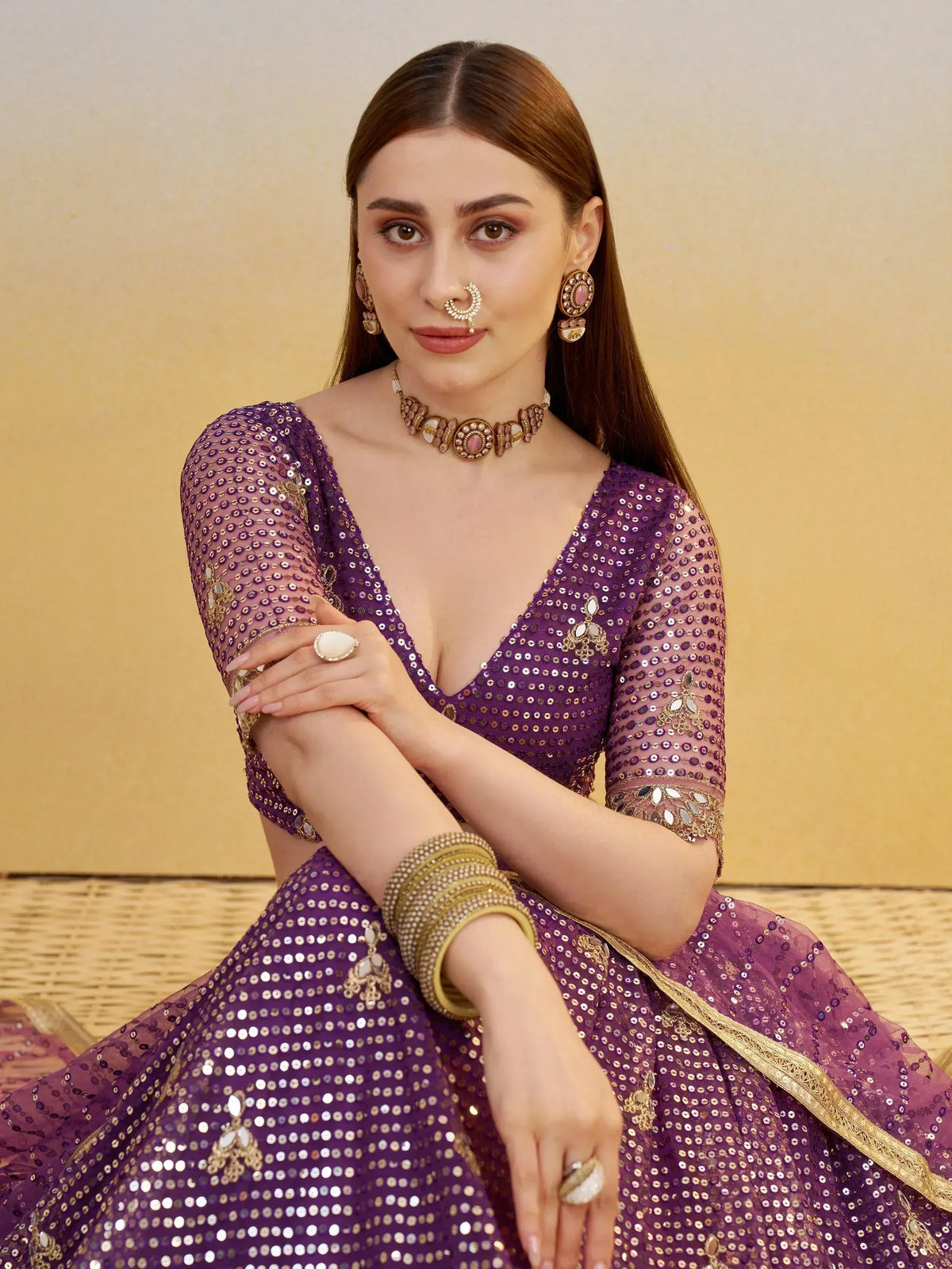 Purple sequin lehenga choli with gold embroidery, traditional Indian ethnic wear for weddings and parties