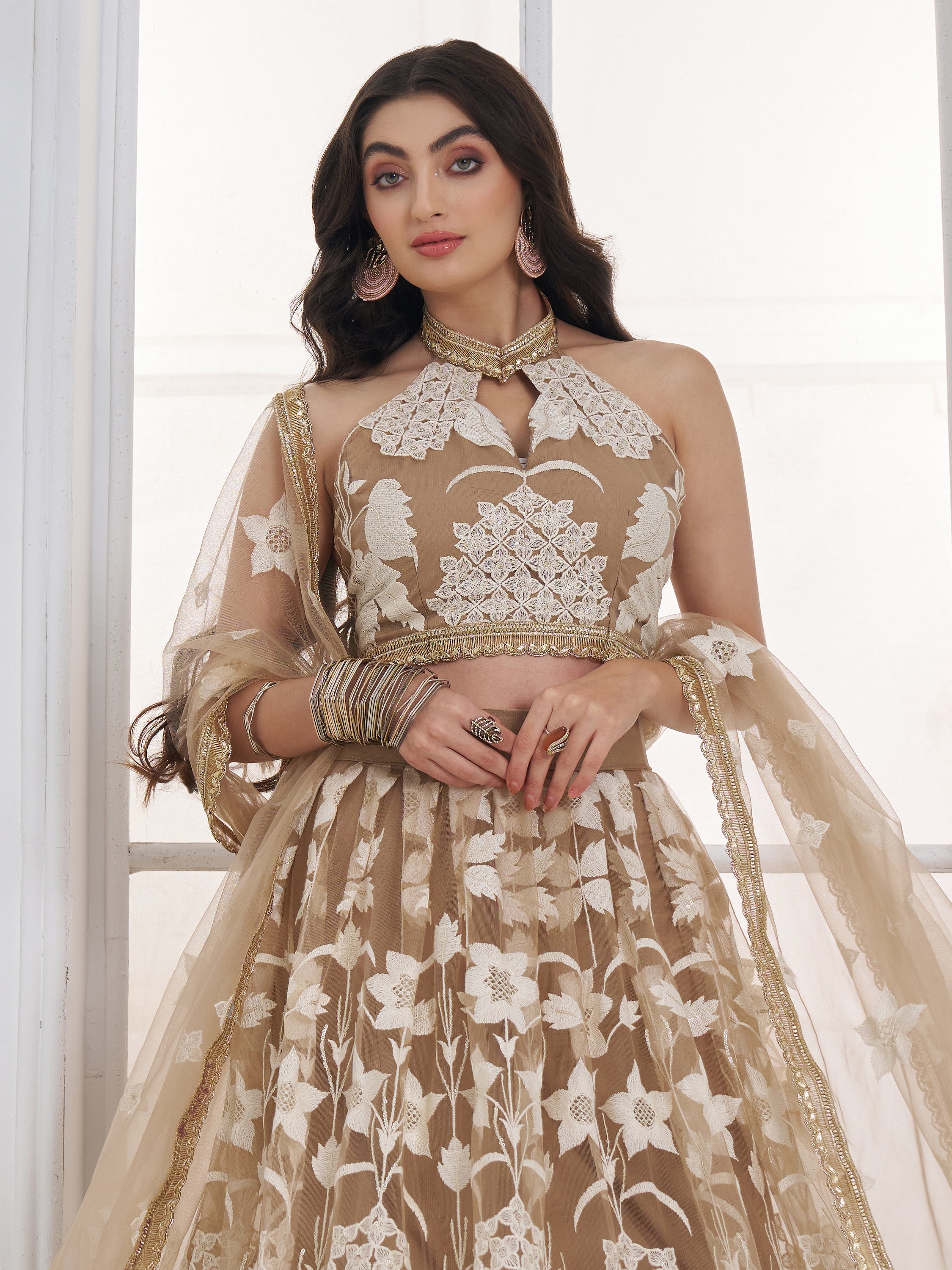 Dazzling Beige Embroidered Net Marriage Wear Lehenga With Blouse