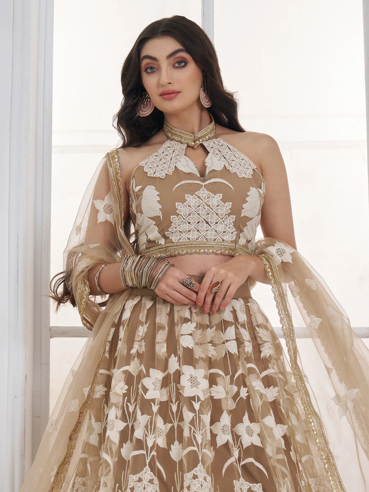 Dazzling Beige Embroidered Net Marriage Wear Lehenga With Blouse