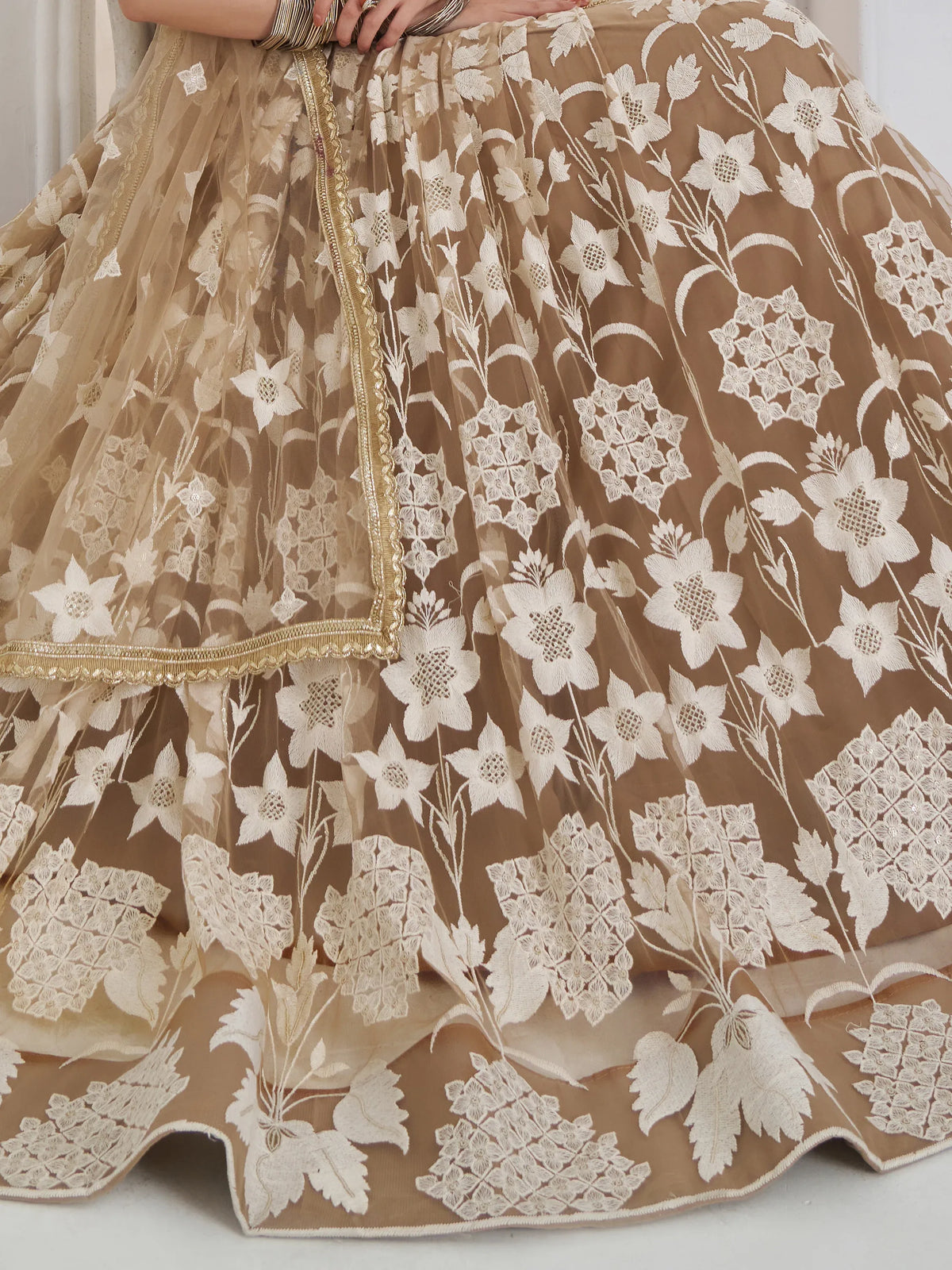 Dazzling Beige Embroidered Net Marriage Wear Lehenga With Blouse