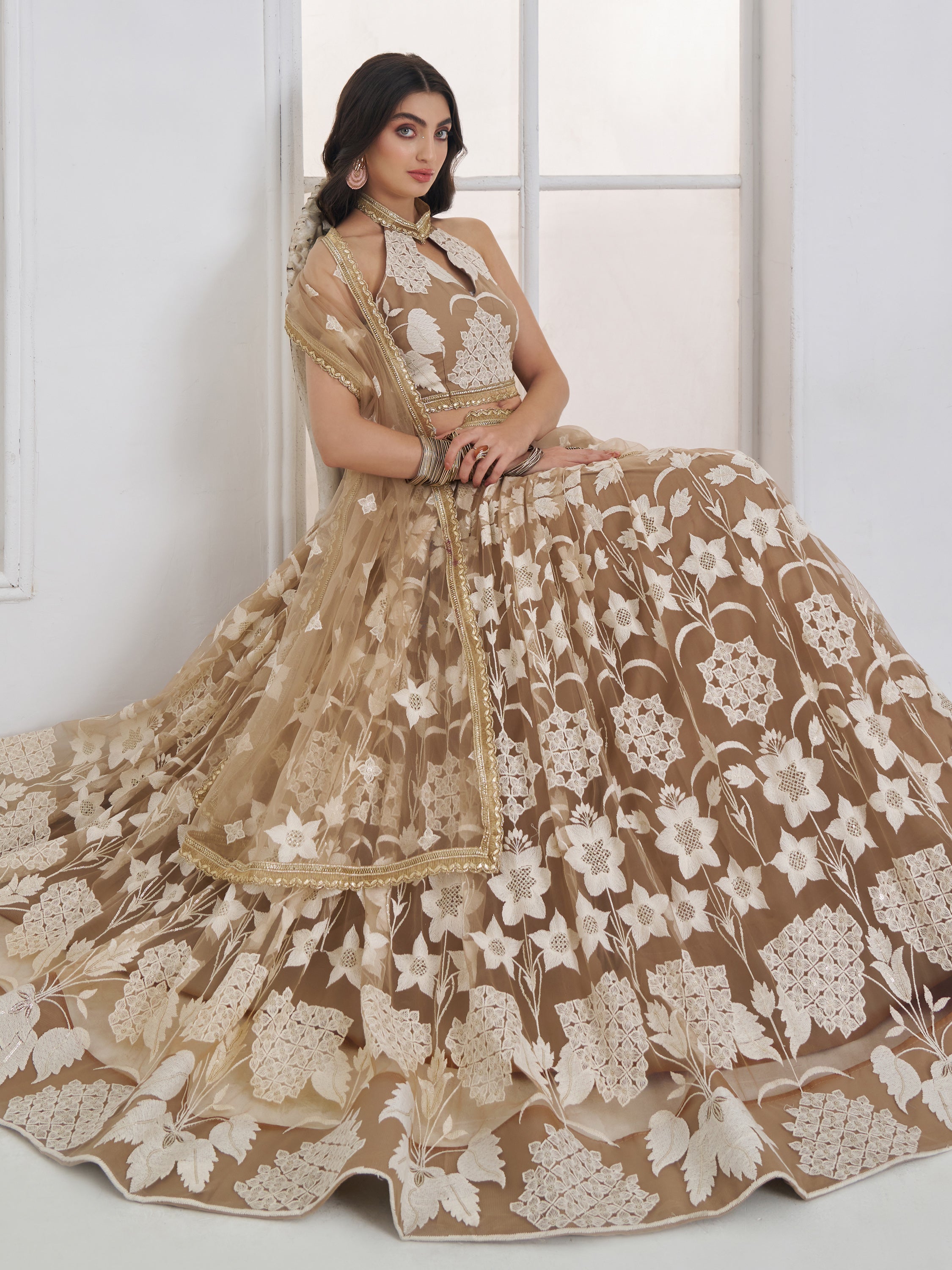 Dazzling Beige Embroidered Net Marriage Wear Lehenga With Blouse
