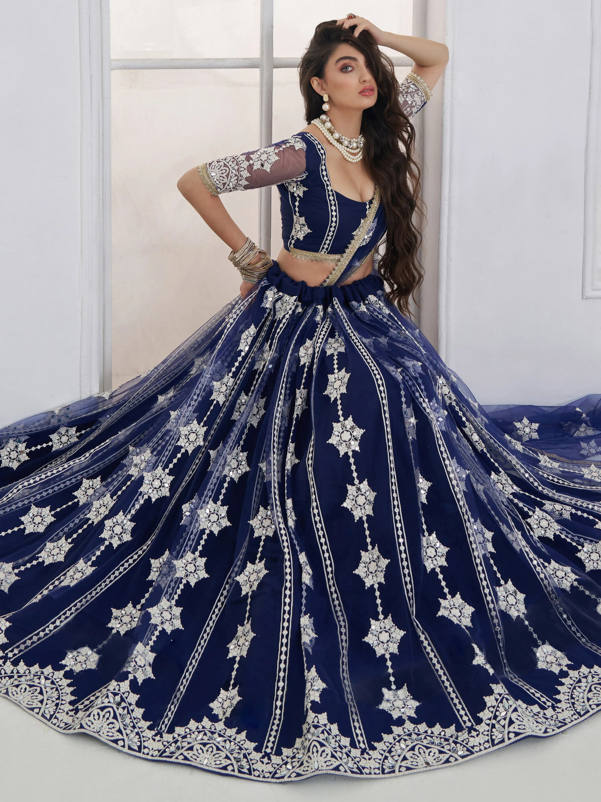 Charming Navy Blue Thread Embroidery Net Wedding Wear Lehenga Choli
