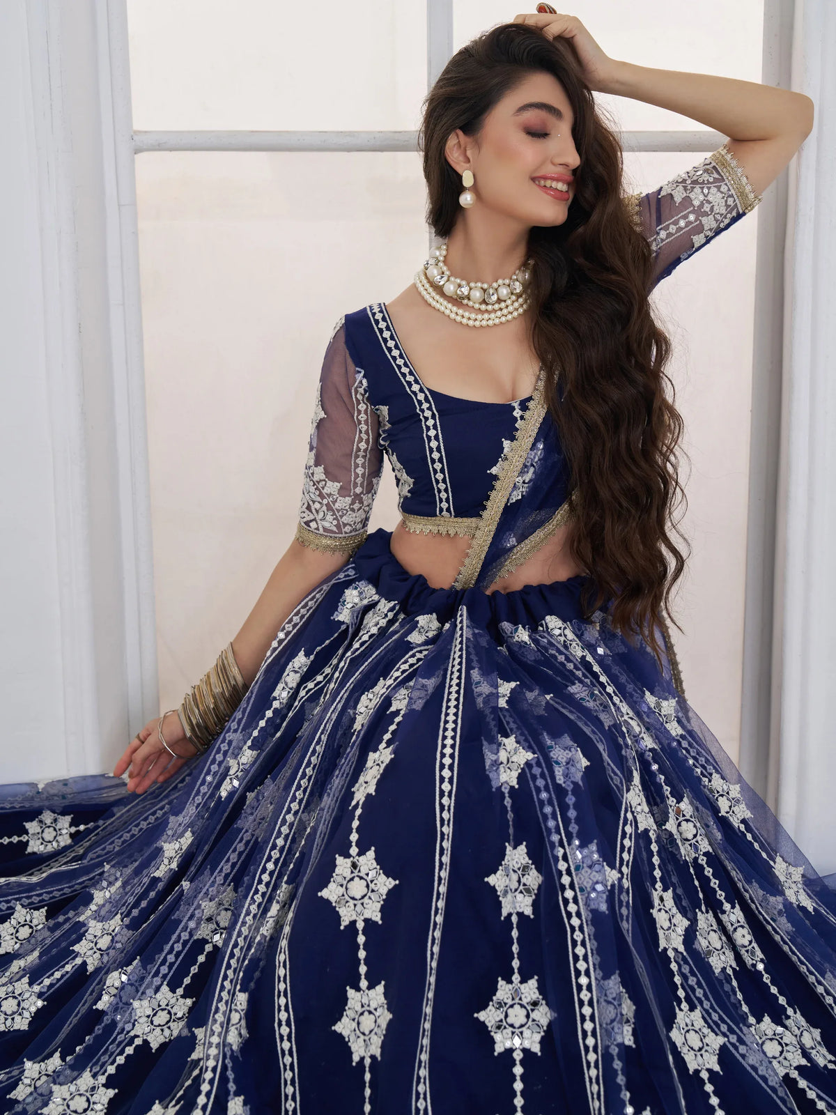 Charming Navy Blue Thread Embroidery Net Wedding Wear Lehenga Choli