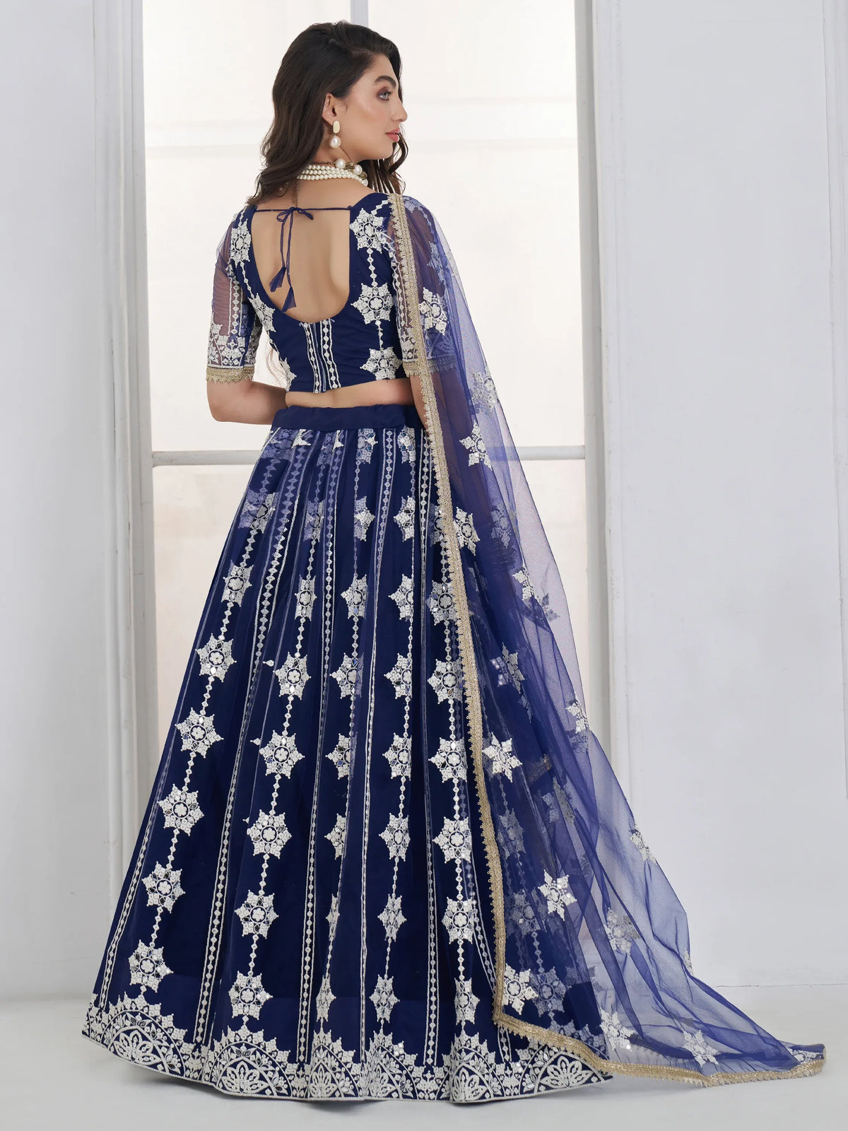 Charming Navy Blue Thread Embroidery Net Wedding Wear Lehenga Choli