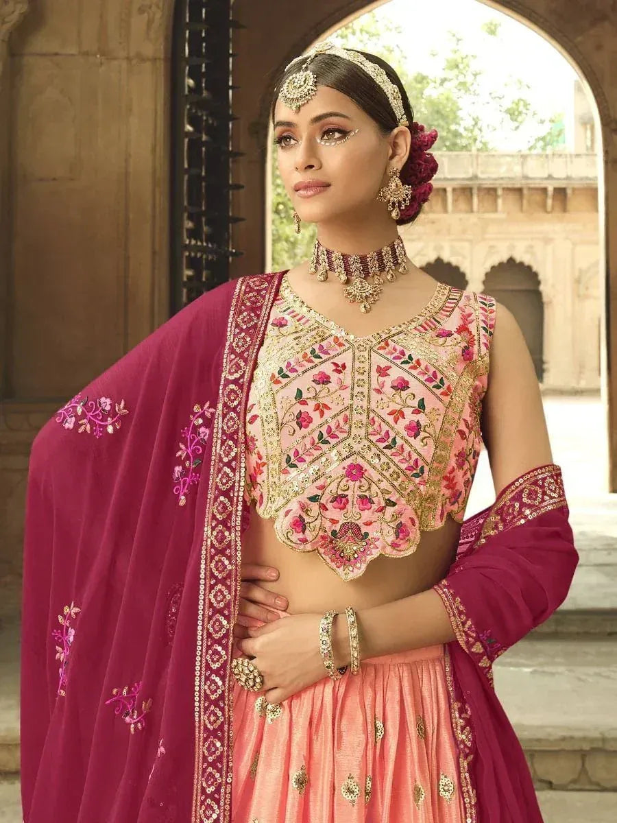 Pink floral embroidered lehenga choli with maroon dupatta, traditional Indian ethnic wear for weddings