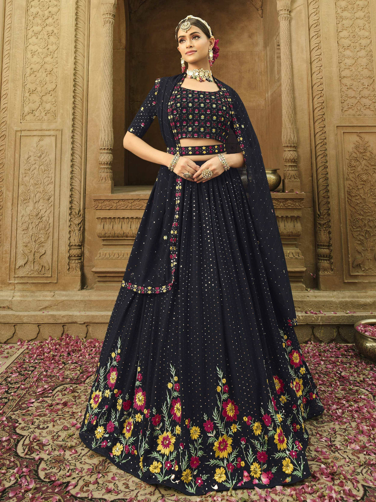 Navy blue floral embroidered lehenga choli with sequins, perfect for Indian weddings and festive occasions.