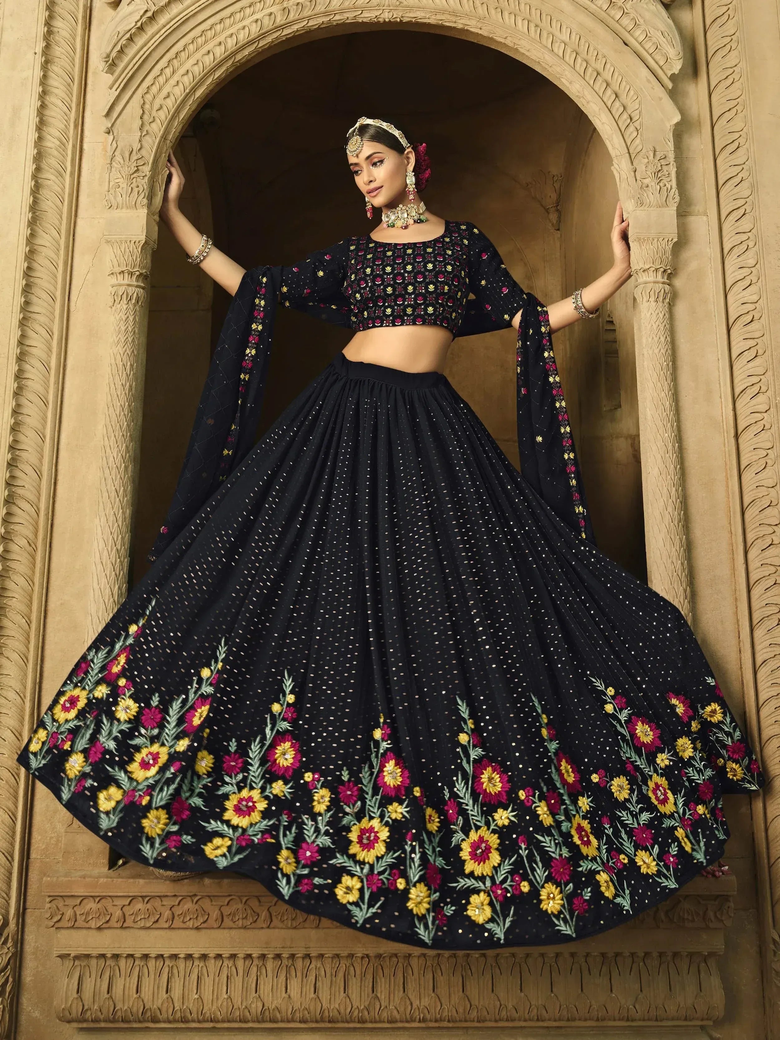 Black floral embroidered lehenga choli with mirror work, perfect for Indian ethnic wear occasions