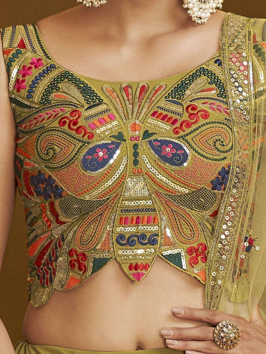 Olive green embroidered blouse with butterfly motif, sequins, and floral detailing for ethnic wear