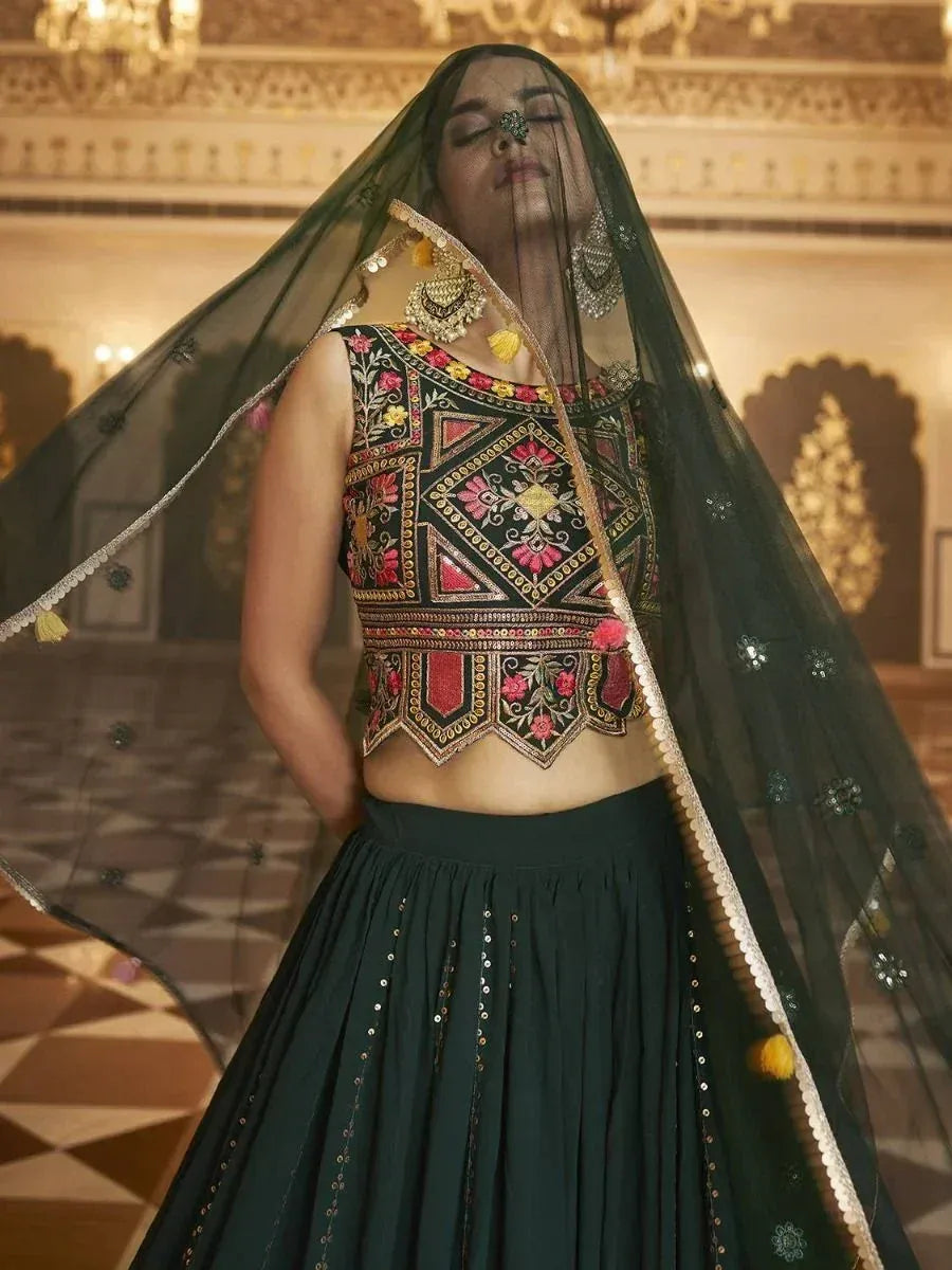 Elegant black lehenga choli with floral embroidery, sequins, and sheer dupatta for Indian ethnic wear