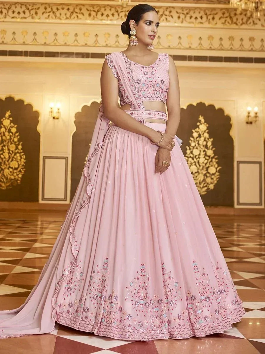 Pink embroidered lehenga choli with floral detailing, perfect for Indian ethnic occasions and weddings