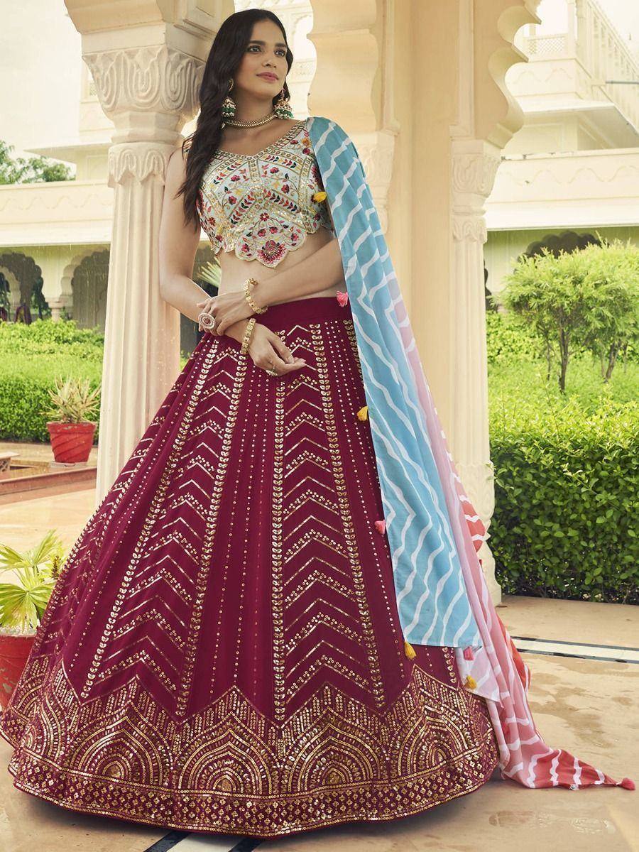 Maroon embroidered lehenga choli with floral blouse and blue dupatta, Indian ethnic wear