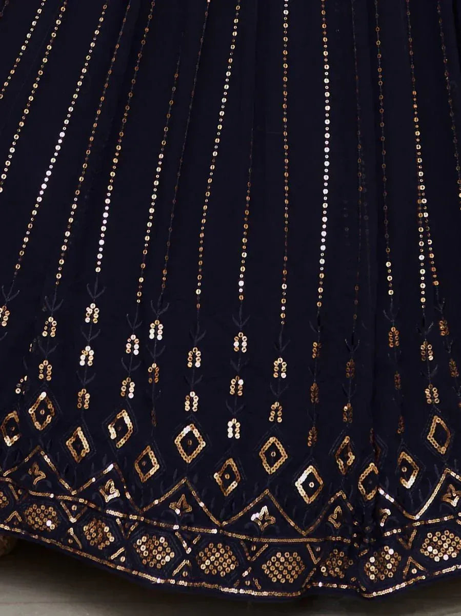 Navy blue lehenga skirt with gold sequin embroidery and geometric border design