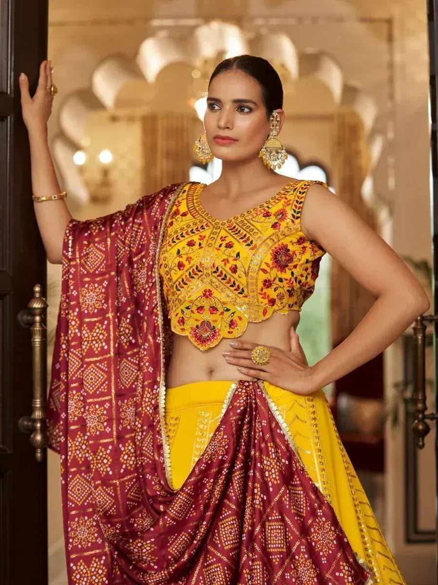 Yellow embroidered lehenga choli with maroon dupatta, Indian ethnic wear for weddings and festivals