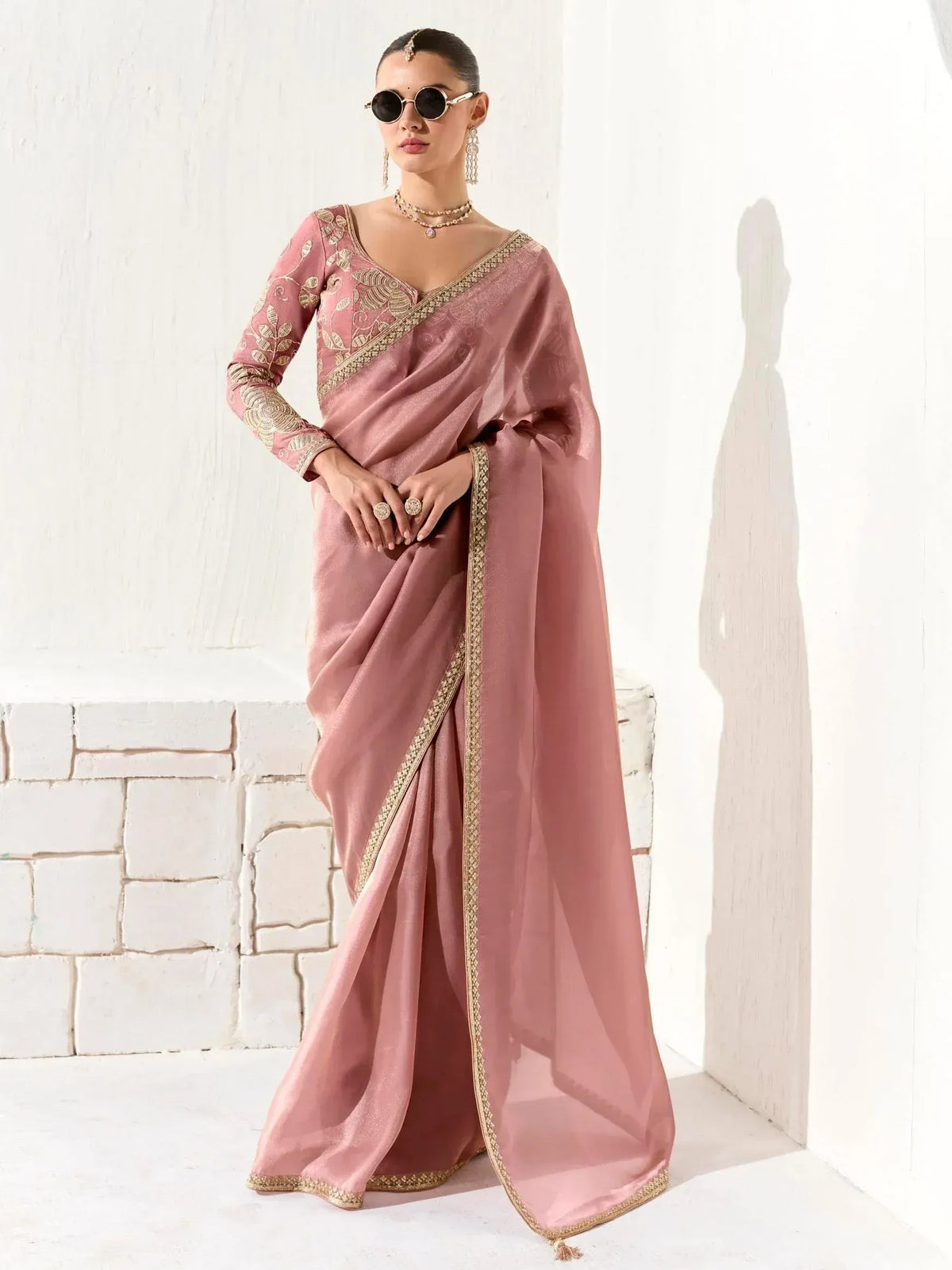 Pink designer saree with gold embroidery, perfect for Indian ethnic wear occasions